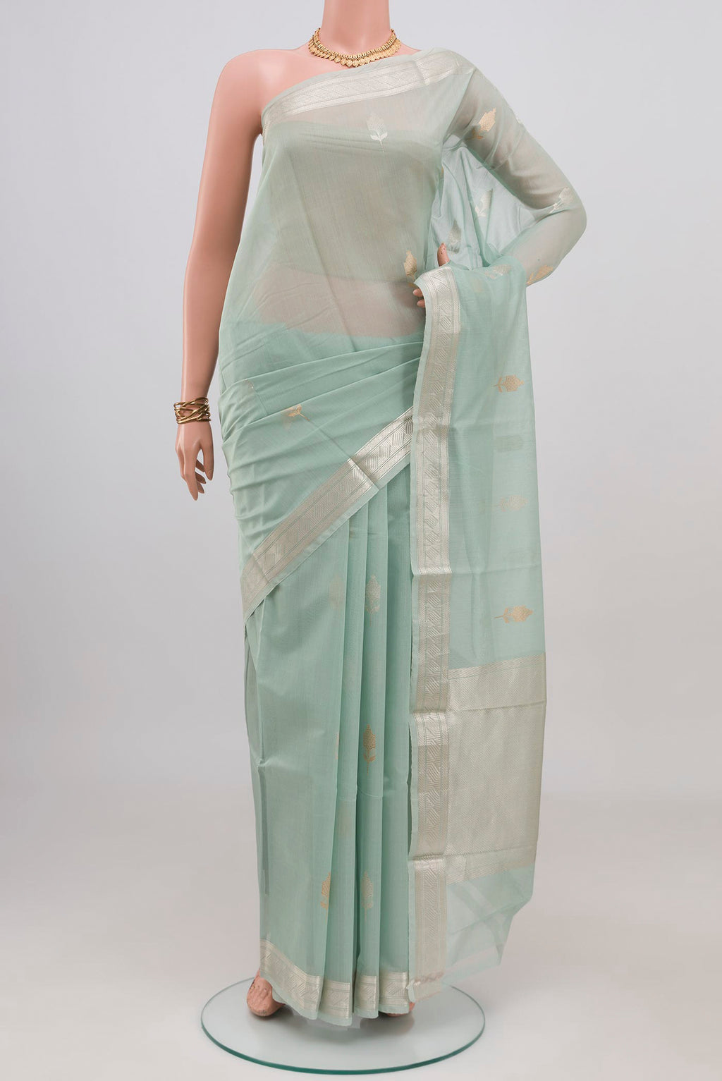 Light Blue Chanderi Silk Cotton Saree with Zari Butta on the body and Zari Border.  displayed on a mannequin
