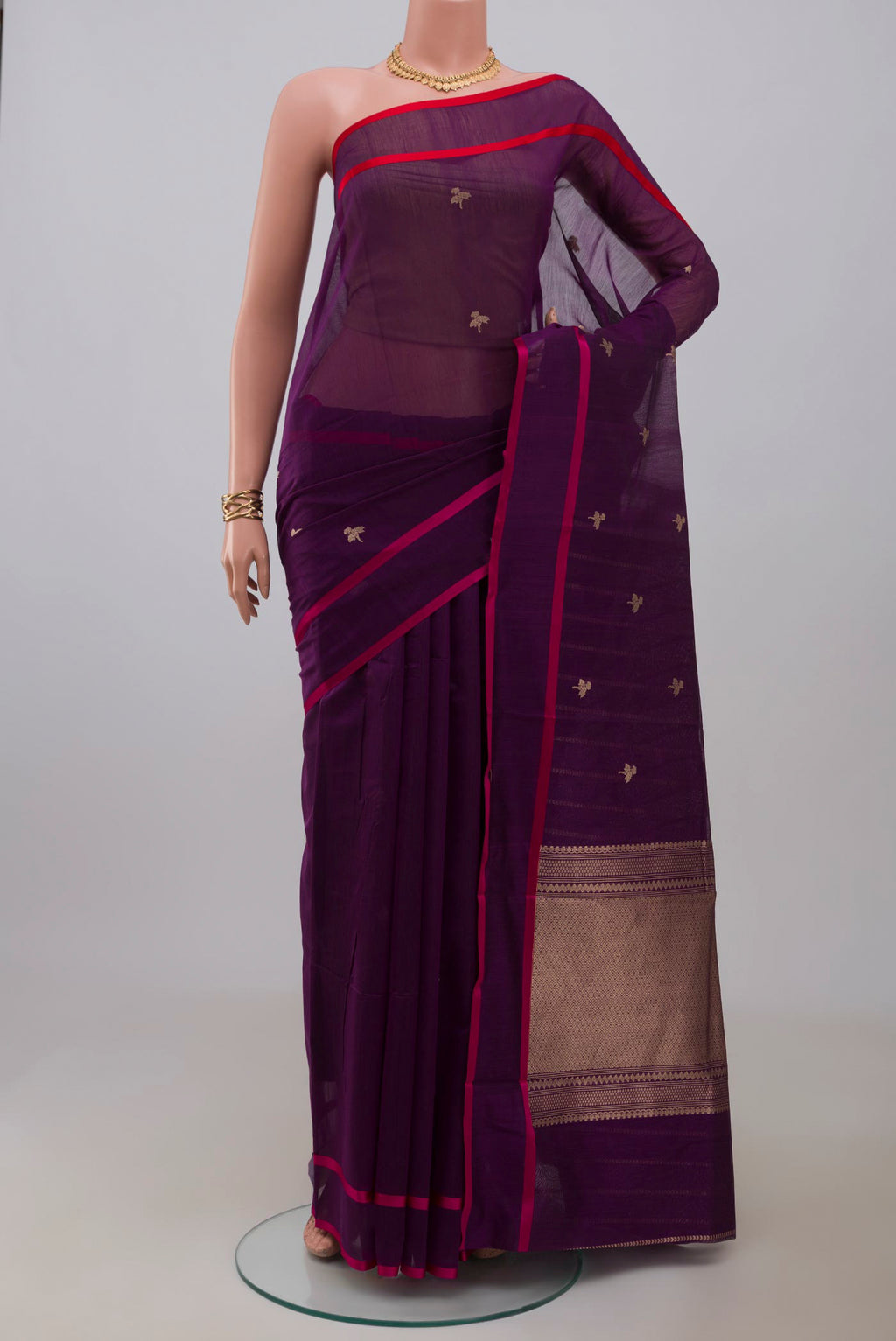 Purple Banarasi Kora Cotton Saree with Zari Butta on the body and Plain Border.  displayed on a mannequin