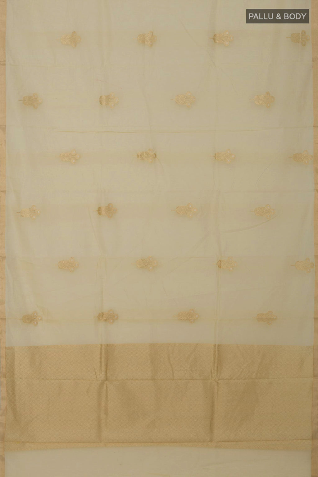 Flat view of Cream Banarasi Kora Cotton Saree with Zari Butta on the body and Zari Border. 