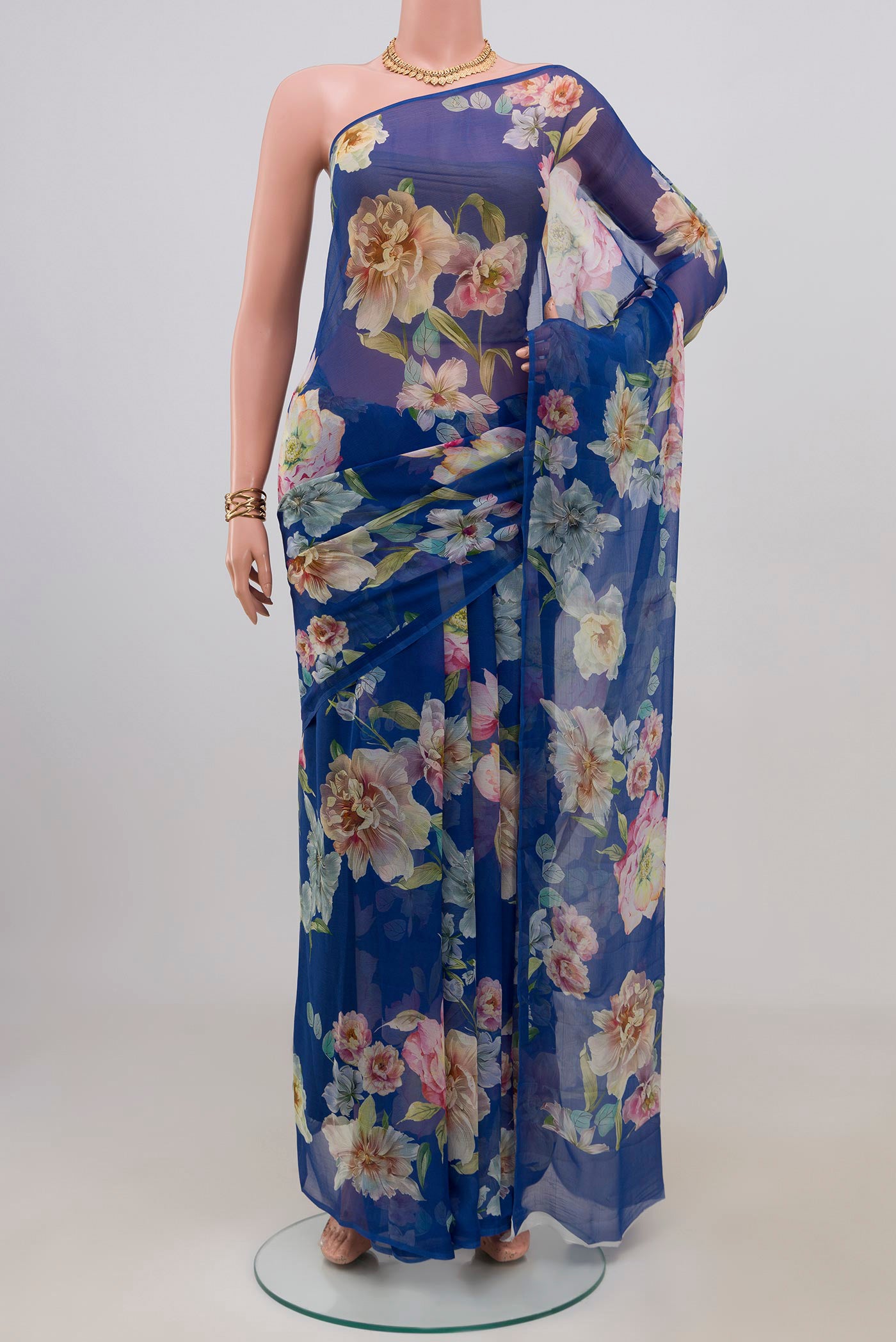 Royal Blue Mysore Chiffon Saree with Floral Print on the body and Without Border.  displayed on a mannequin