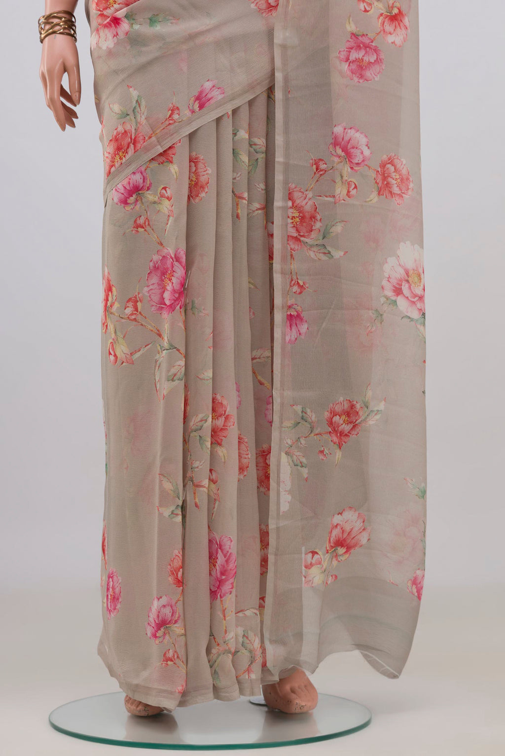 Pleats and pallu of Grey Mysore Chiffon Saree with Floral Print on the body and Without Border. 