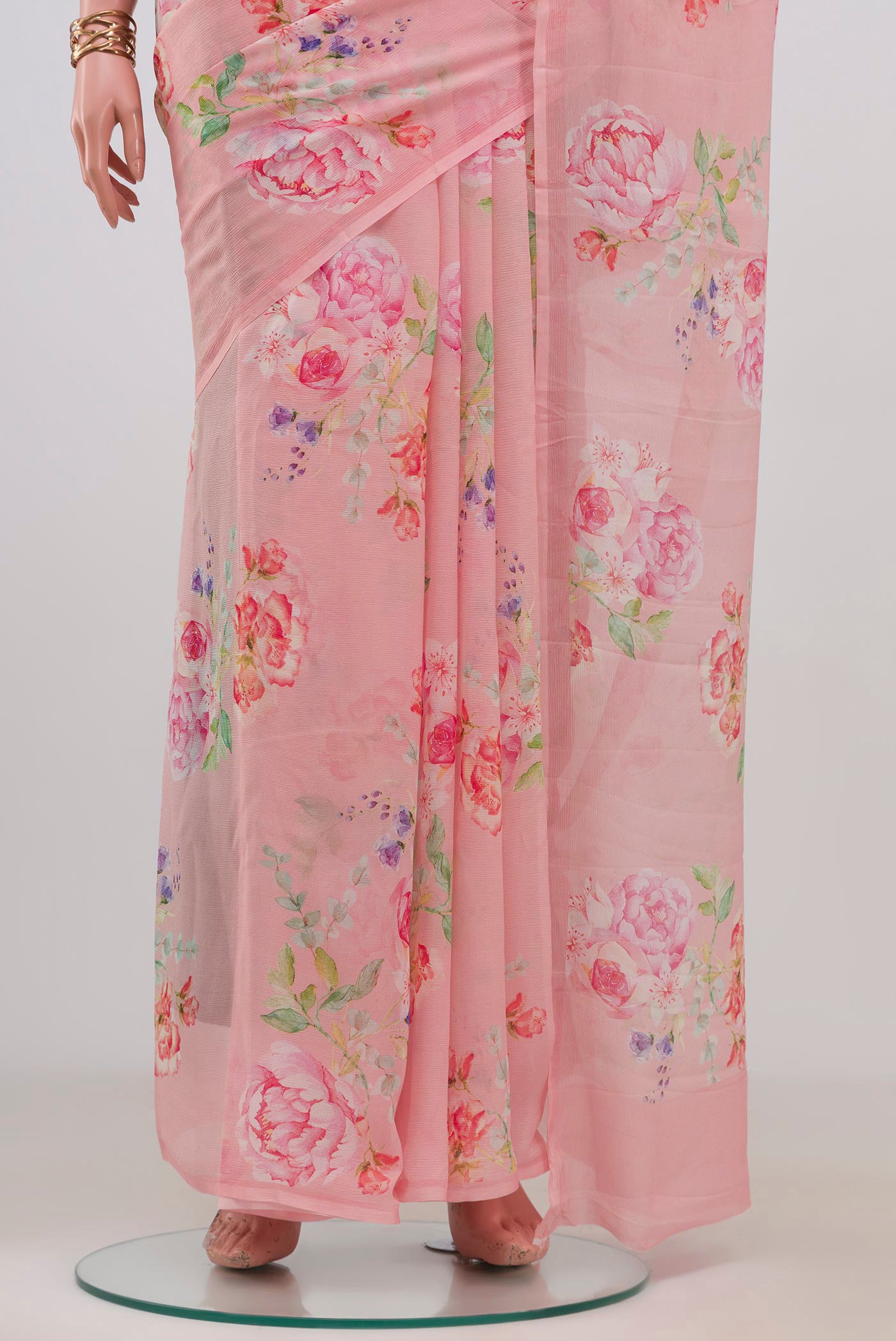 Pleats and pallu of Rose pink Mysore Chiffon Saree with Floral Print on the body and Without Border. 