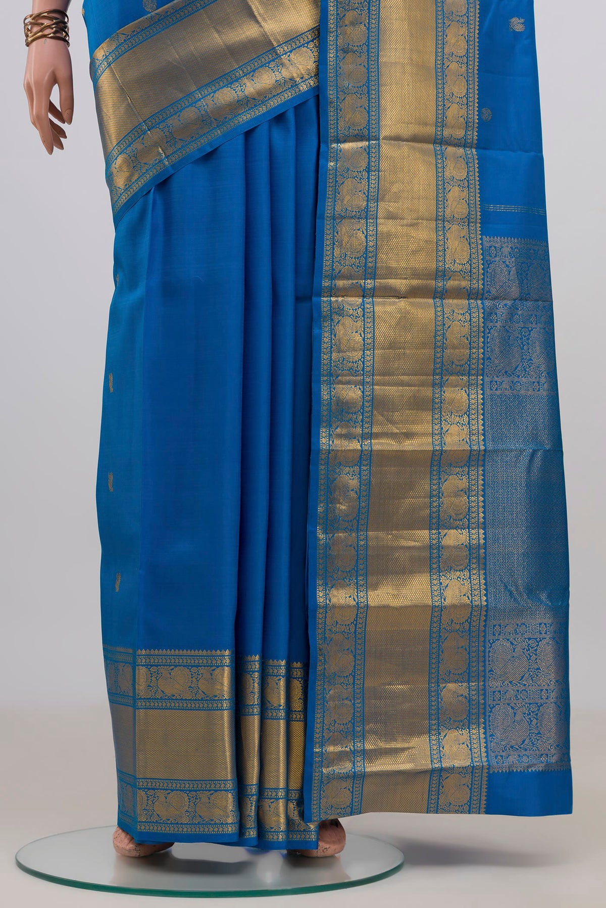 Pleats and pallu of Pure Silk Blue Kanjivaram Saree with Zari Butta on the body and Zari Border. 