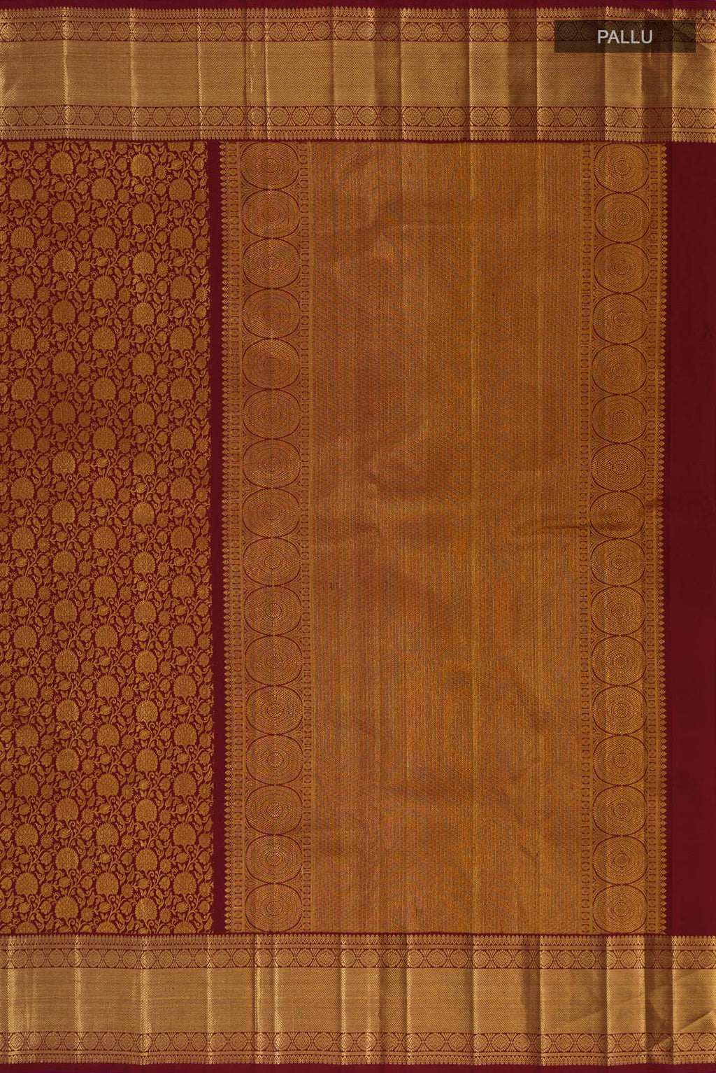 Close up image of the pallu of Maroon Kanchipuram Silk Saree with Zari Brocade on the body and Zari Border. 