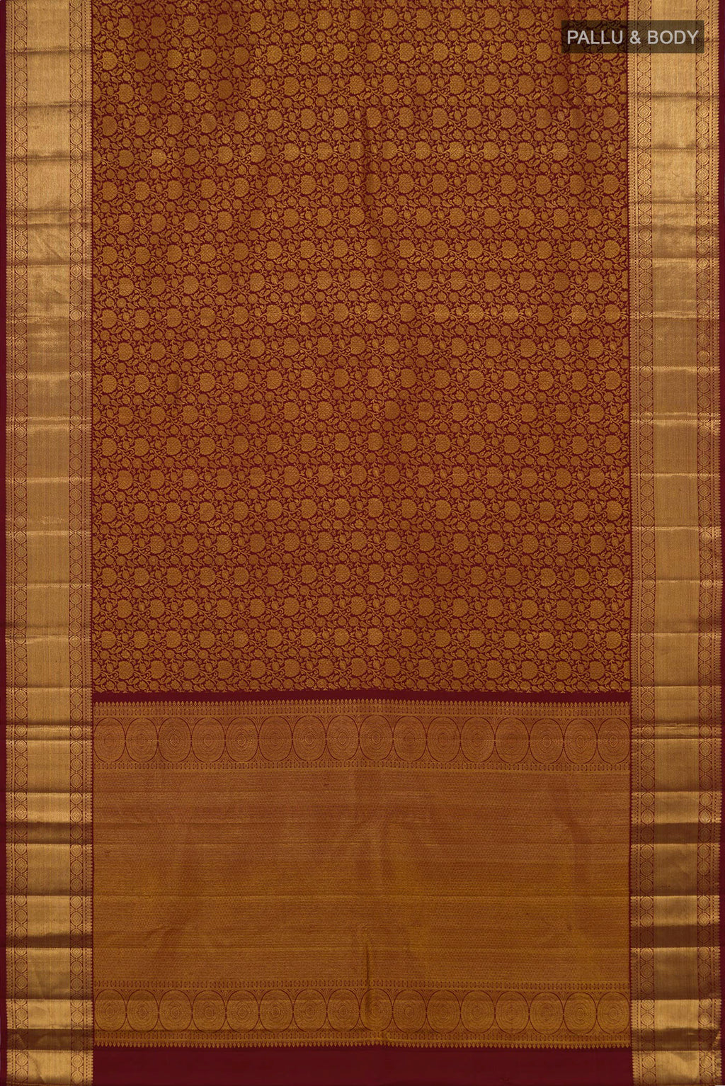 Flat view of Maroon Kanchipuram Silk Saree with Zari Brocade on the body and Zari Border. 