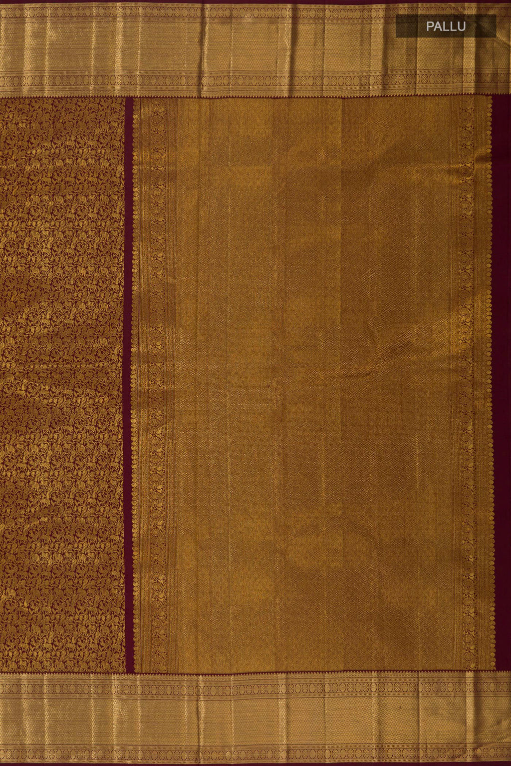 Close up image of the pallu of Brown Kanchipuram Silk Saree with Zari Brocade on the body and Zari Border. 