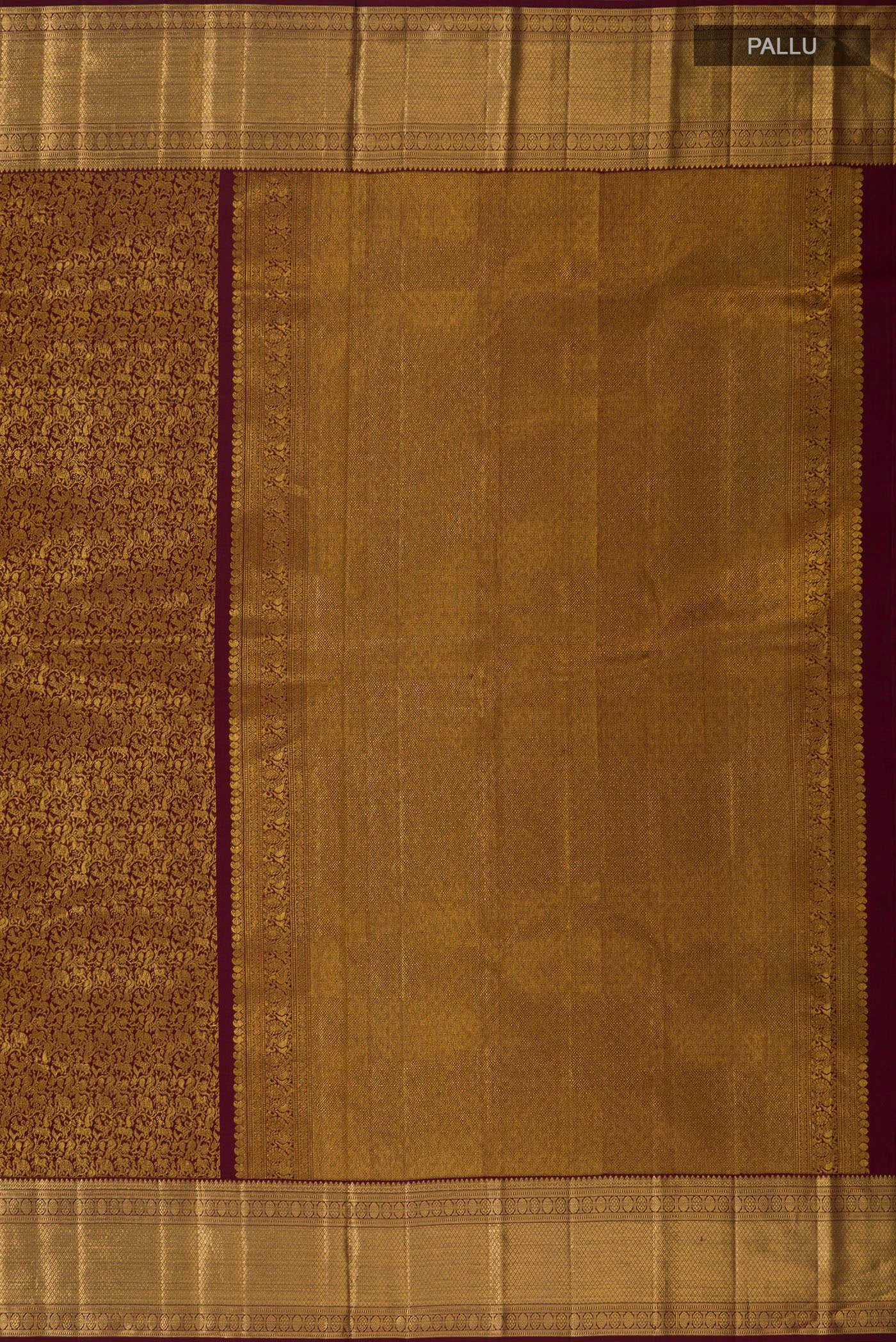 Close up image of the pallu of Brown Kanchipuram Silk Saree with Zari Brocade on the body and Zari Border. 
