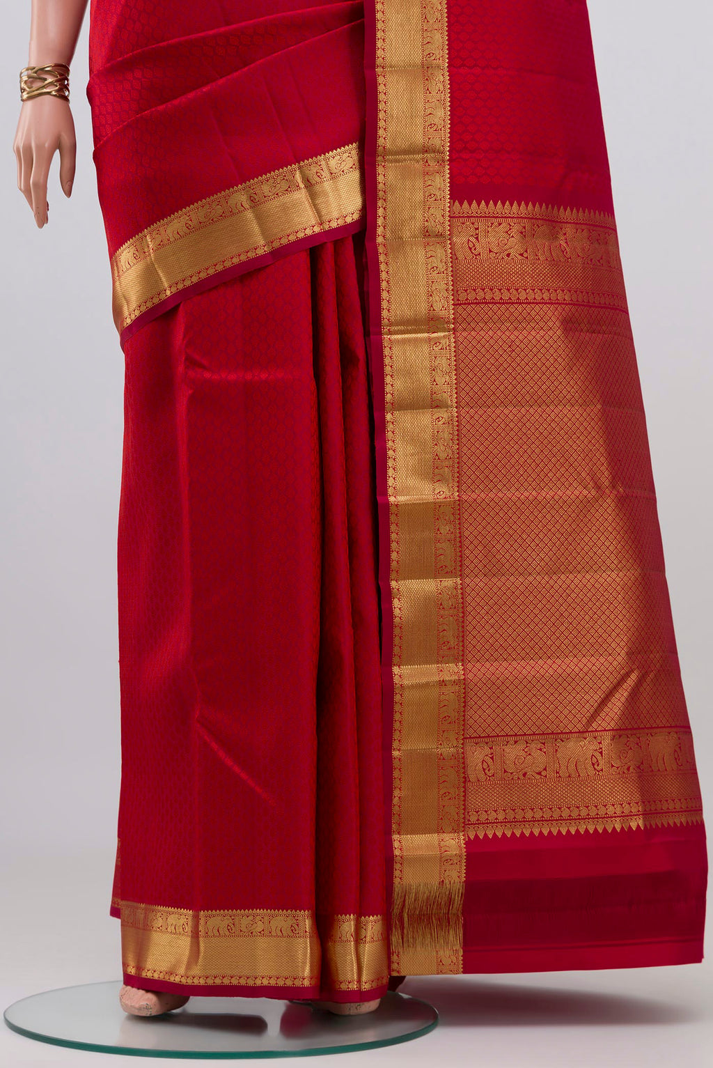 Pleats and pallu of Red Kanjivaram Silk Saree with Jacquard design on the body and Zari Border. 