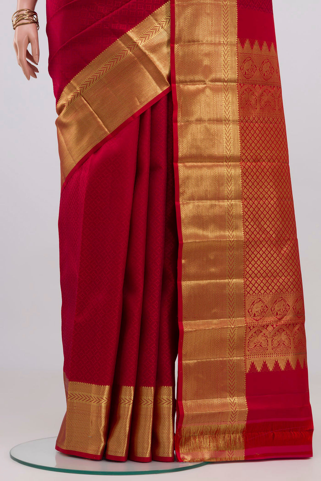 Pleats and pallu of Red Kanjivaram Silk Saree with Jacquard design on the body and Zari Border. 