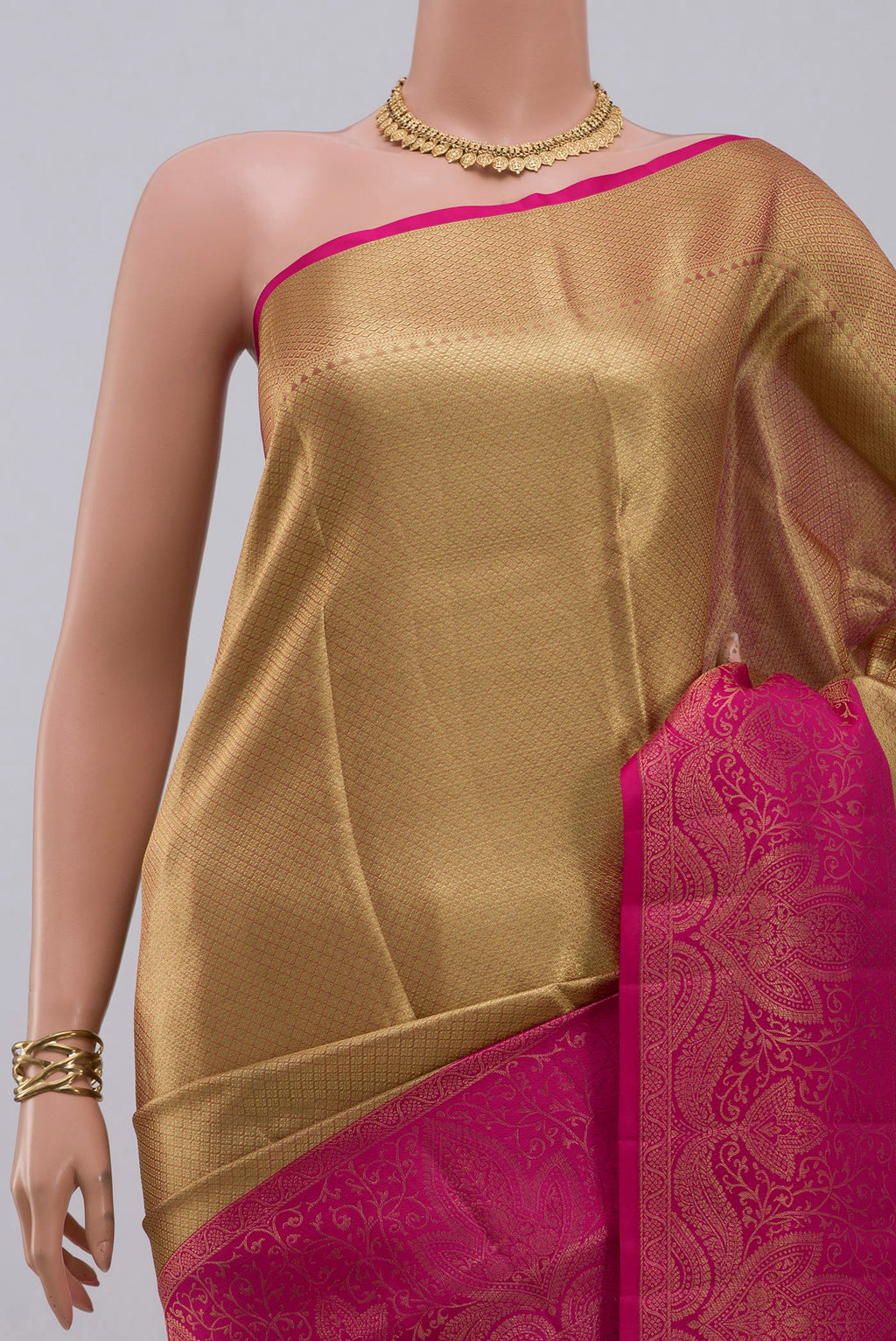 Border image of Golden Kanchipuram Silk Saree with Zari Brocade on the body and Fancy Border. 