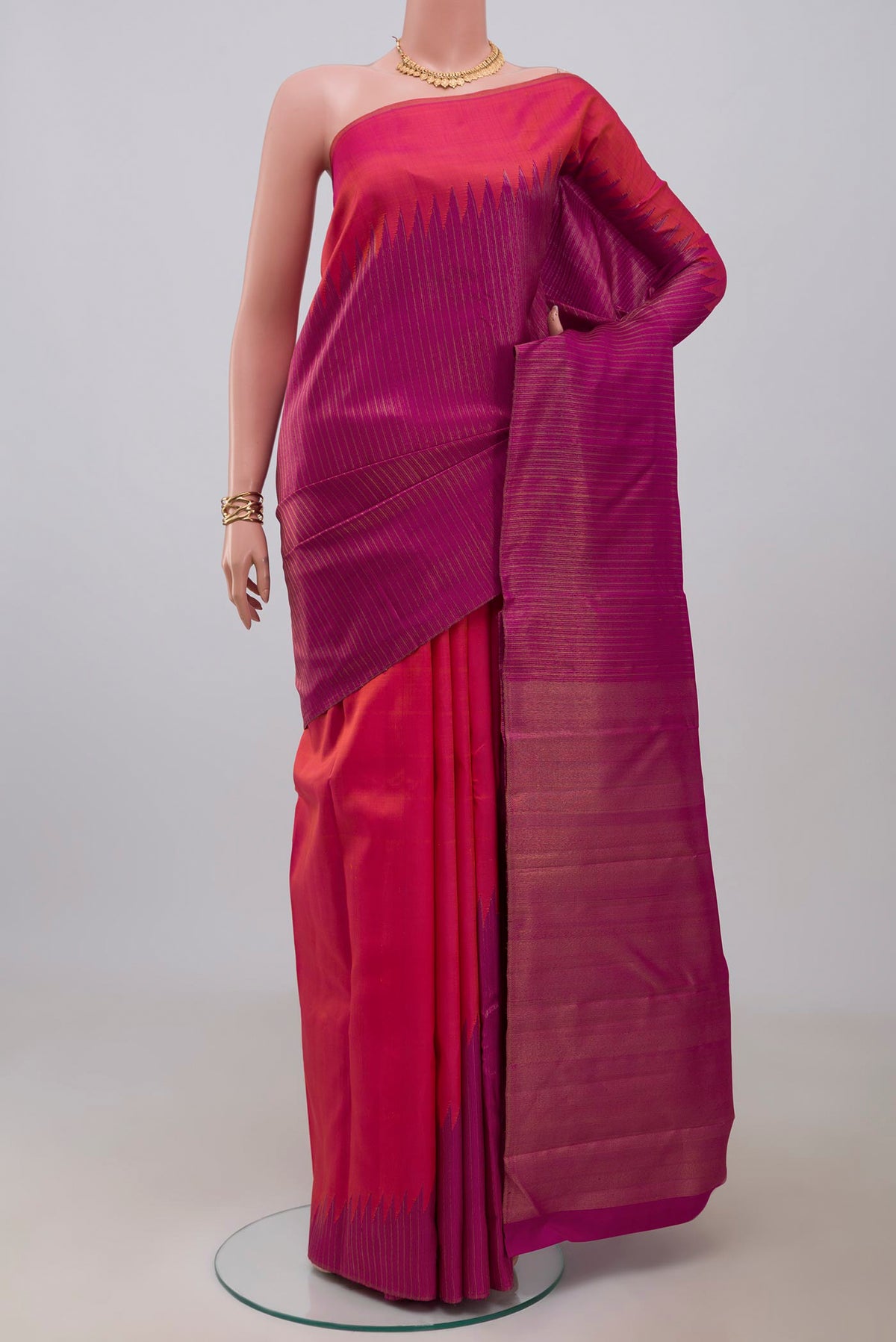 Pure Silk Pure Zari Purple Kanjivaram Saree with Fancy on the body and Rising Temple Border.  displayed on a mannequin