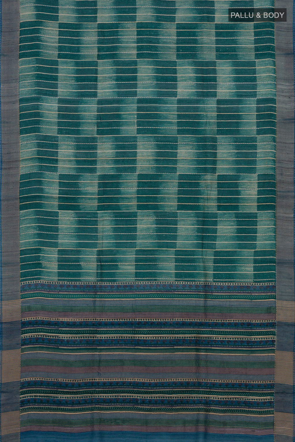 Flat view of Green Tussar Silk Saree with Printed design on the body and Zari Border. 