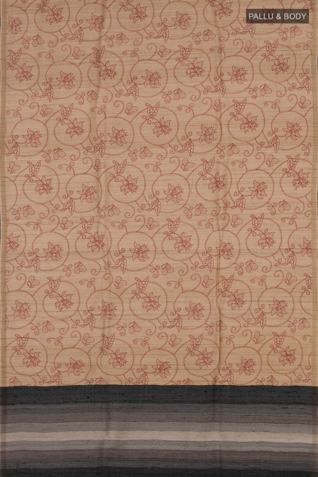 Flat view of Sandal Tussar Silk Saree with Printed design on the body and Thin Zari Line. 