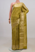 Pure Silk Mehandi Green Kanchipuram Saree with Zari Brocade on the body and Zari Border.  displayed on a mannequin
