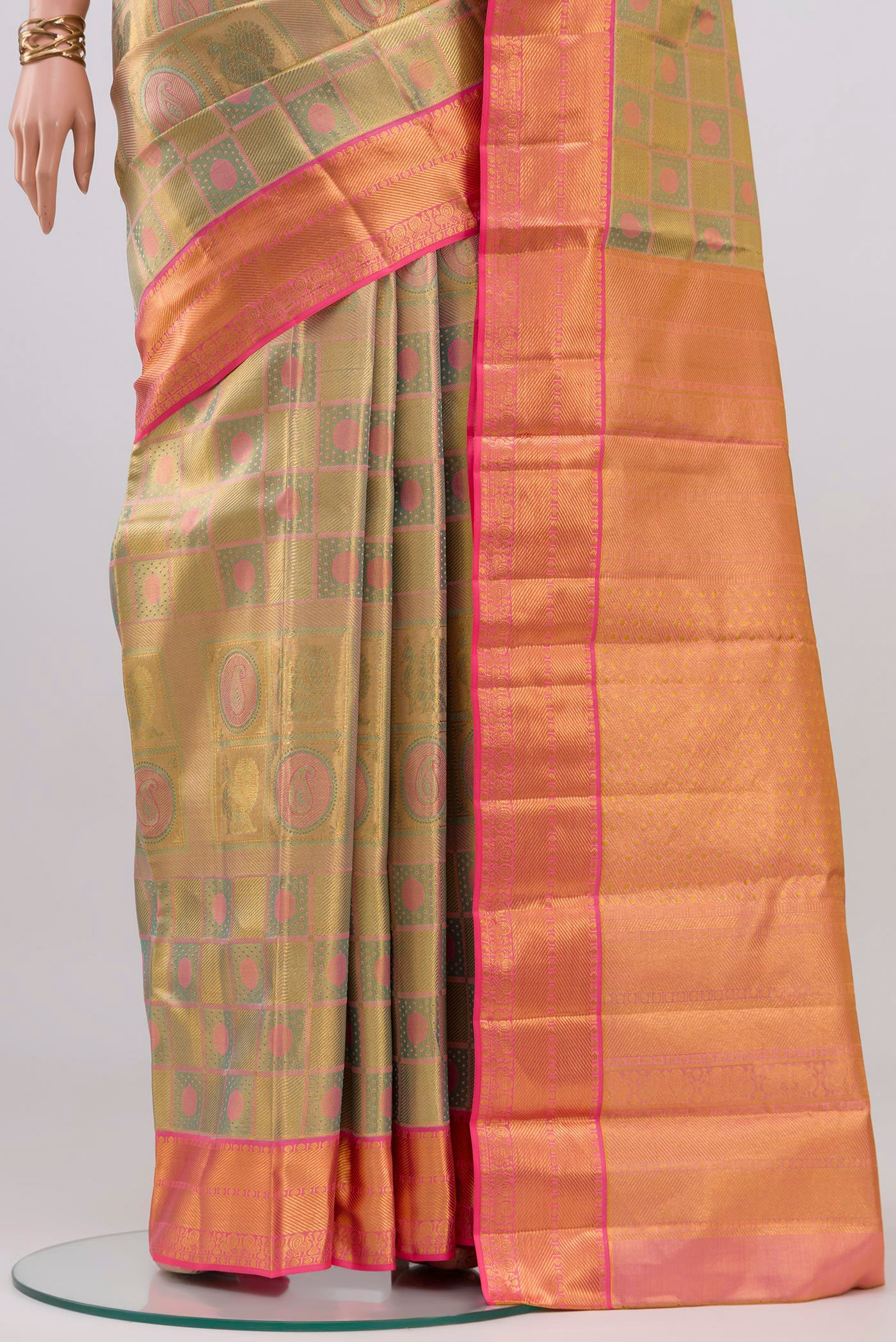 Pleats and pallu of Golden Dual Tone Kanchipuram Tissue Silk Saree with Zari Brocade on the body and Zari Border. 