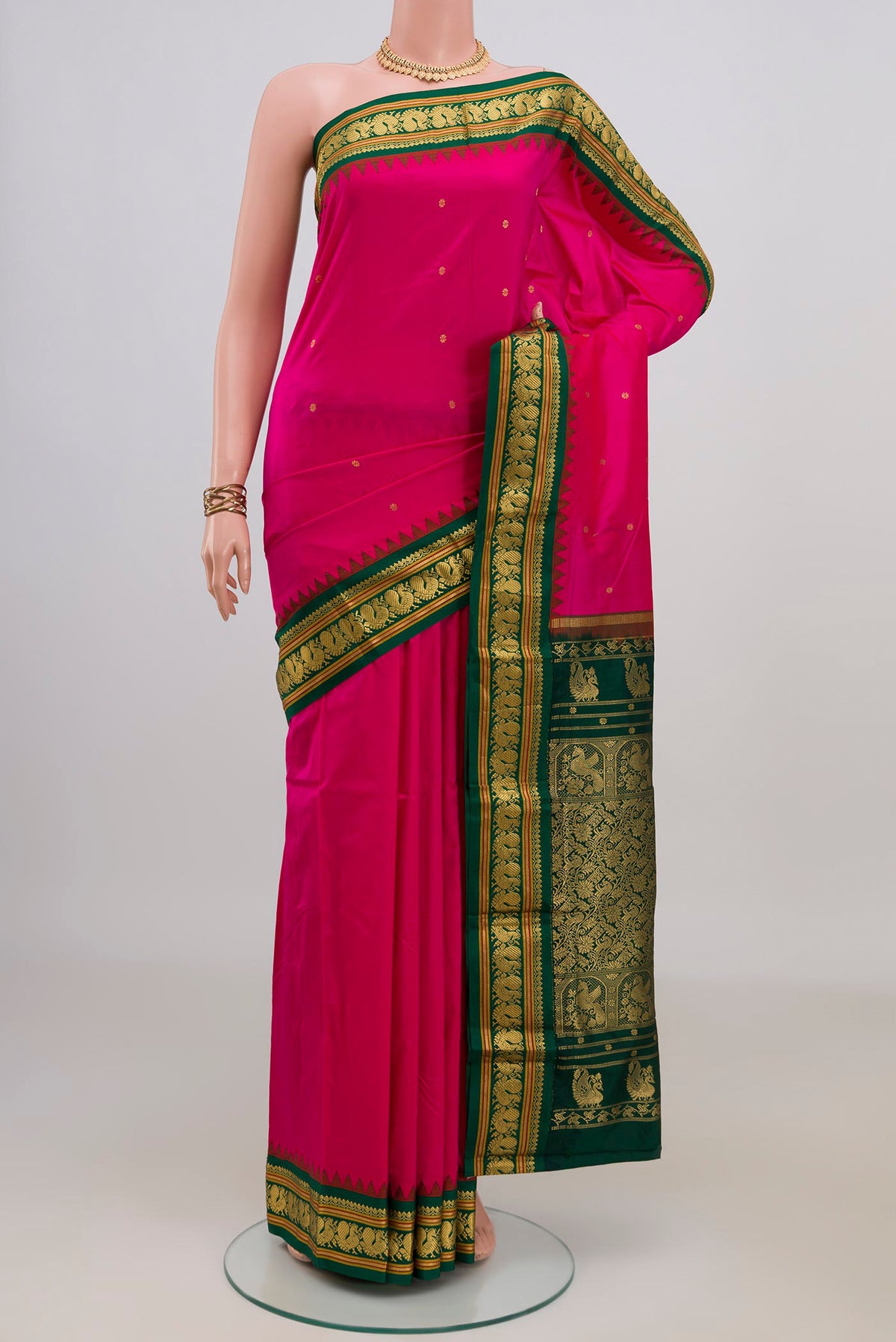 Pure Silk Pink Bangalore Saree with Zari Butta on the body and Zari Border.  displayed on a mannequin