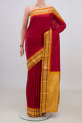 Pure Silk Red Bangalore Saree with Zari Butta on the body and Zari Border.  displayed on a mannequin