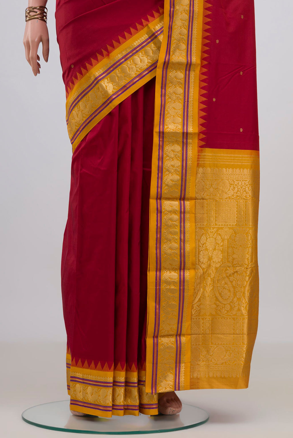 Pleats and pallu of Pure Silk Red Bangalore Saree with Zari Butta on the body and Zari Border. 