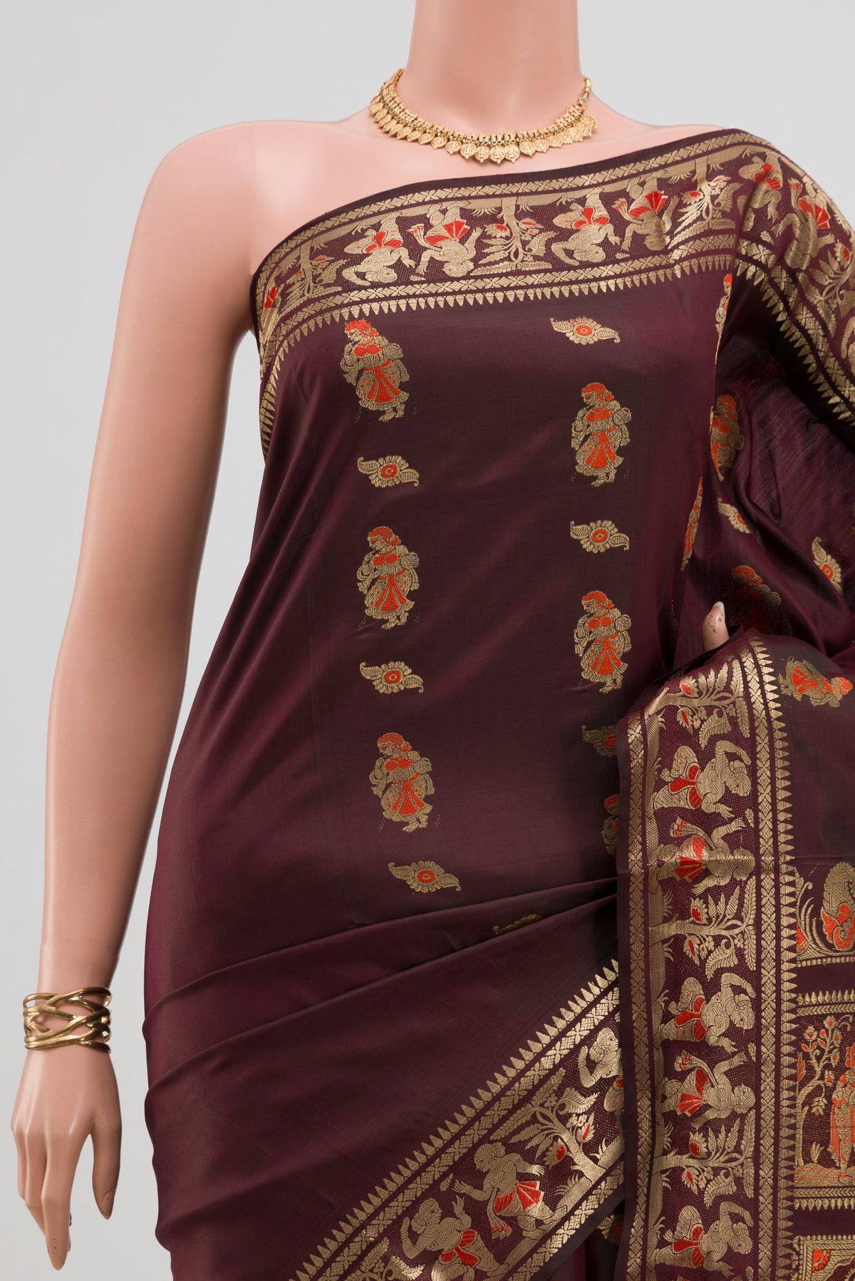 Border image of Coffee Brown Baluchari Silk Saree with Zari Butta on the body and Zari Border. 