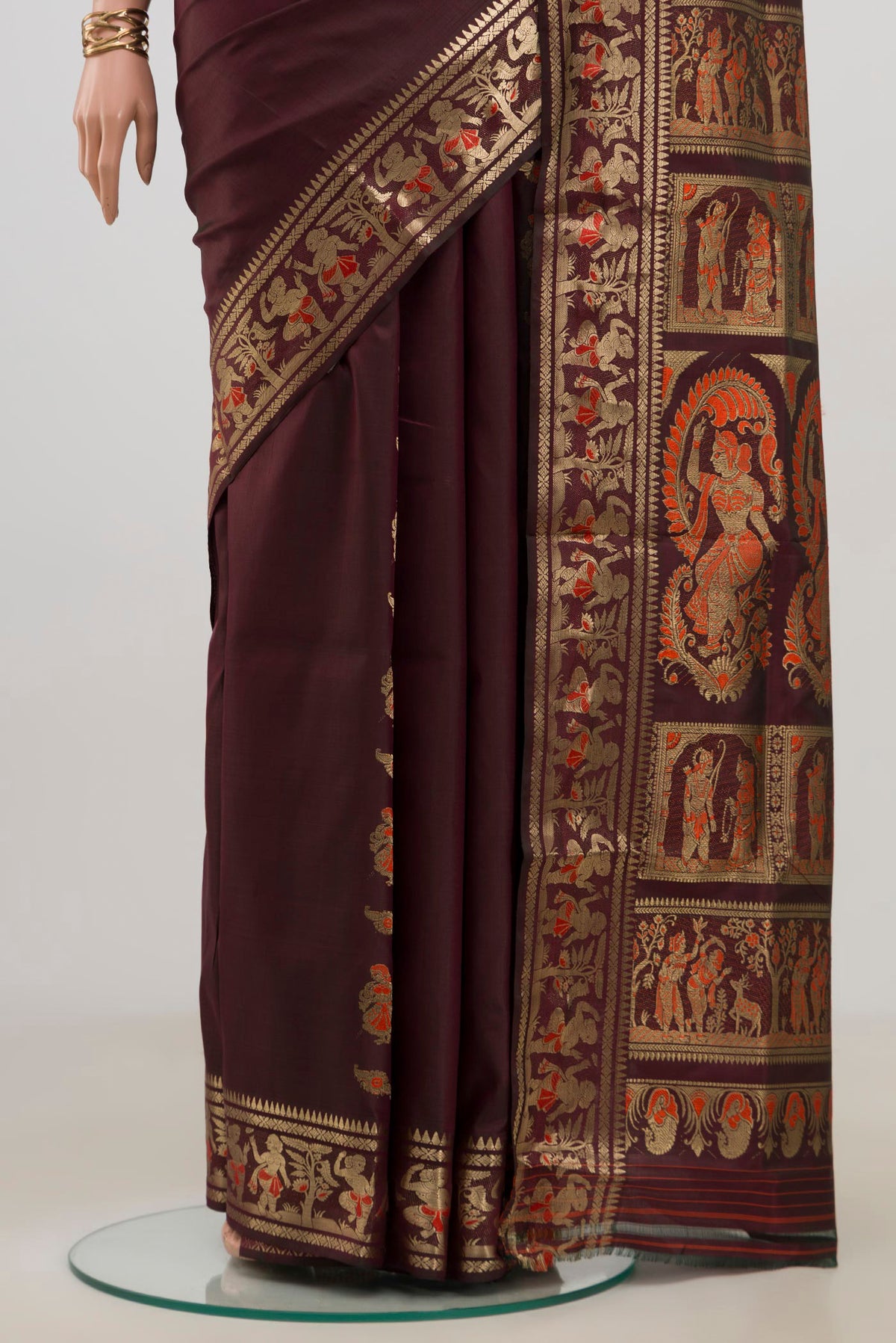 Pleats and pallu of Coffee Brown Baluchari Silk Saree with Zari Butta on the body and Zari Border. 