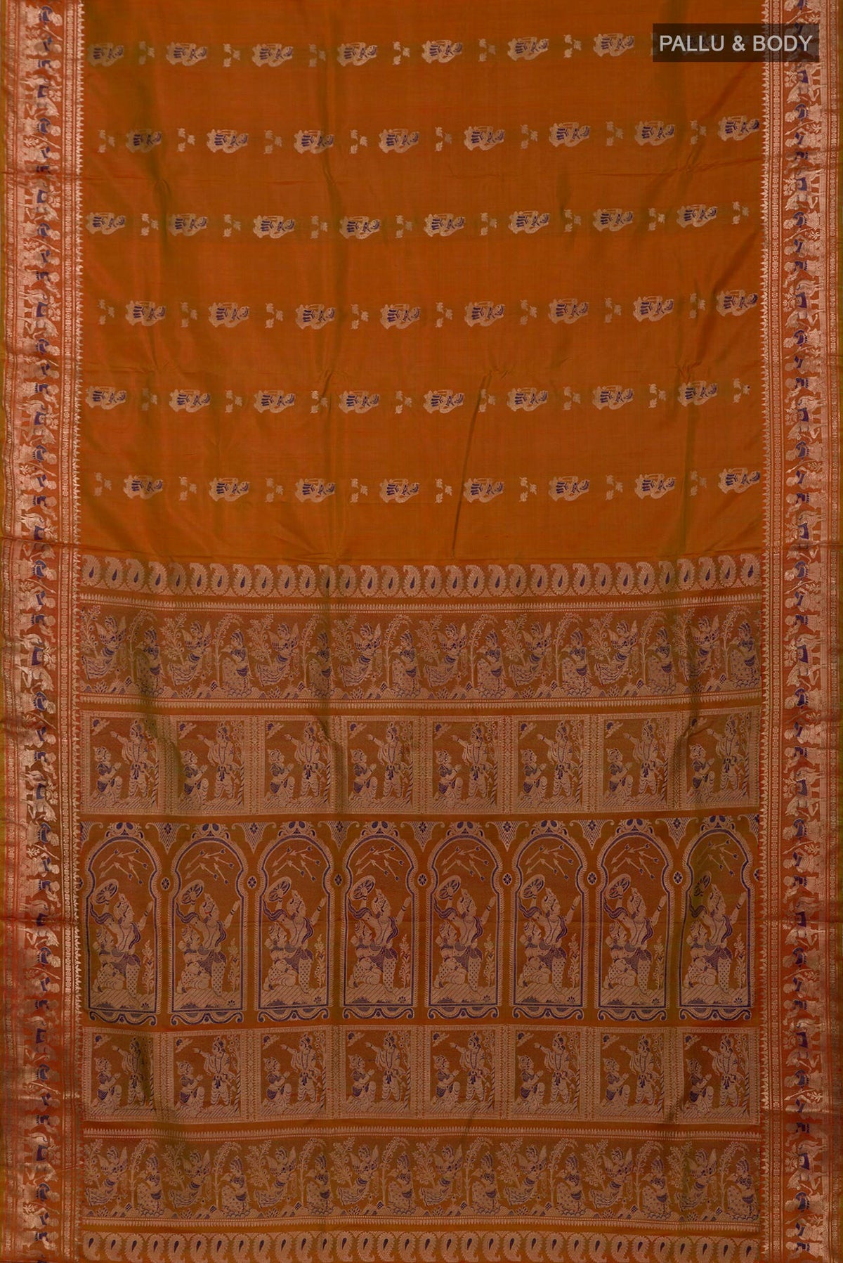 Flat view of Brick Orange Baluchari Silk Saree with Zari And Thread Butta on the body and Zari Border. 