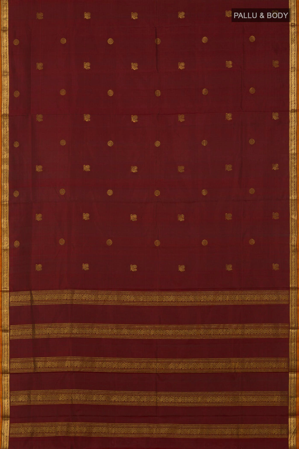 Flat view of Maroon Kanchipuram Silk Saree with Zari Butta on the body and Zari Border. 