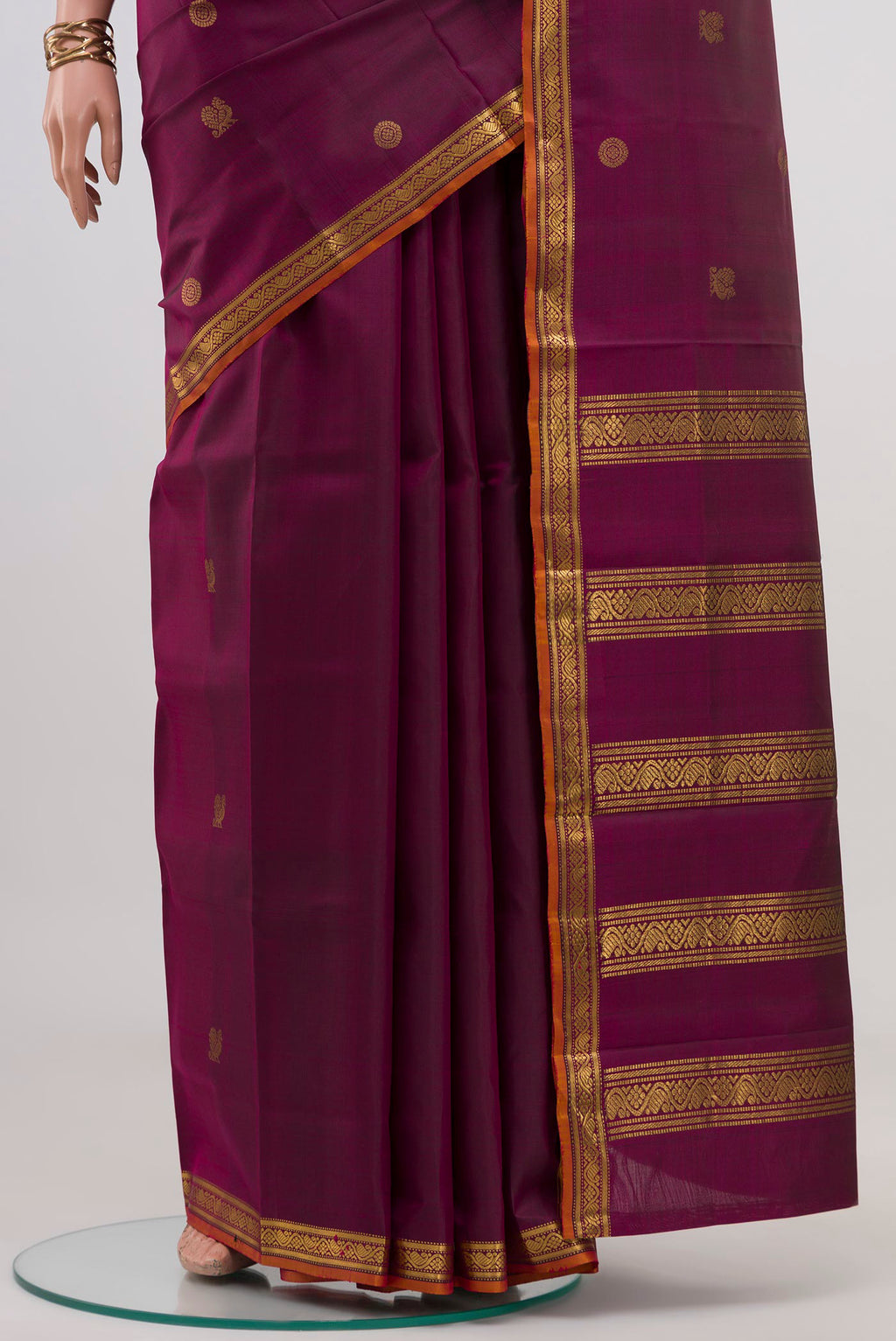 Pleats and pallu of Pure Silk Pure Zari Purple Kanchipuram Saree with Zari Butta on the body and Zari Border. 