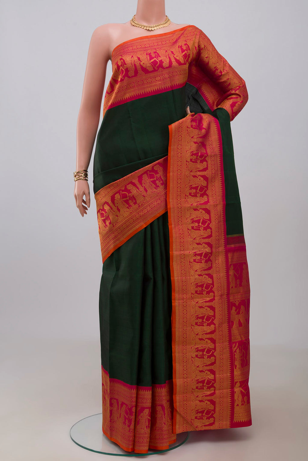 Pure Silk Pure Zari Green Kanchipuram Saree with Plain Body and Fancy Border.  displayed on a mannequin