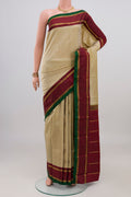Pure Silk Pure Zari Cream Kanjivaram Saree with Plain Body and Zari Border.  displayed on a mannequin