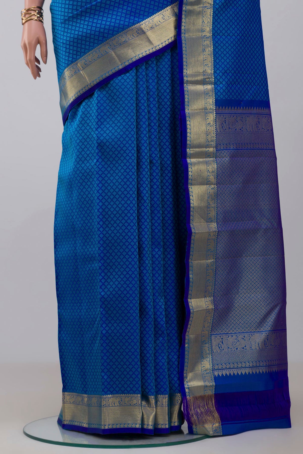 Pleats and pallu of Royal Blue Kanjivaram Silk Saree with Jacquard design on the body and Zari Border. 