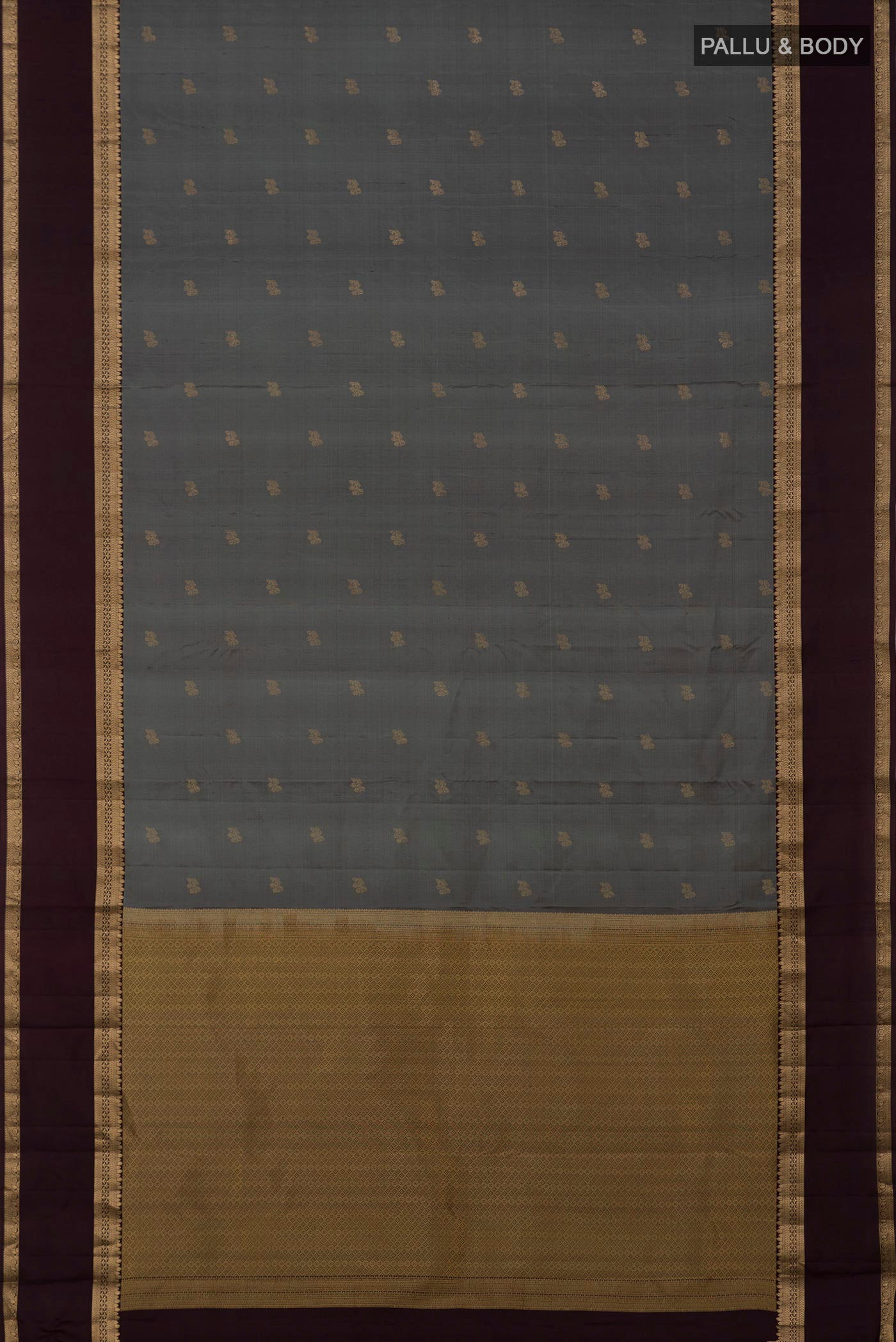 Flat view of Grey Kanchipuram Silk Saree with Zari Butta on the body and Zari Border. 
