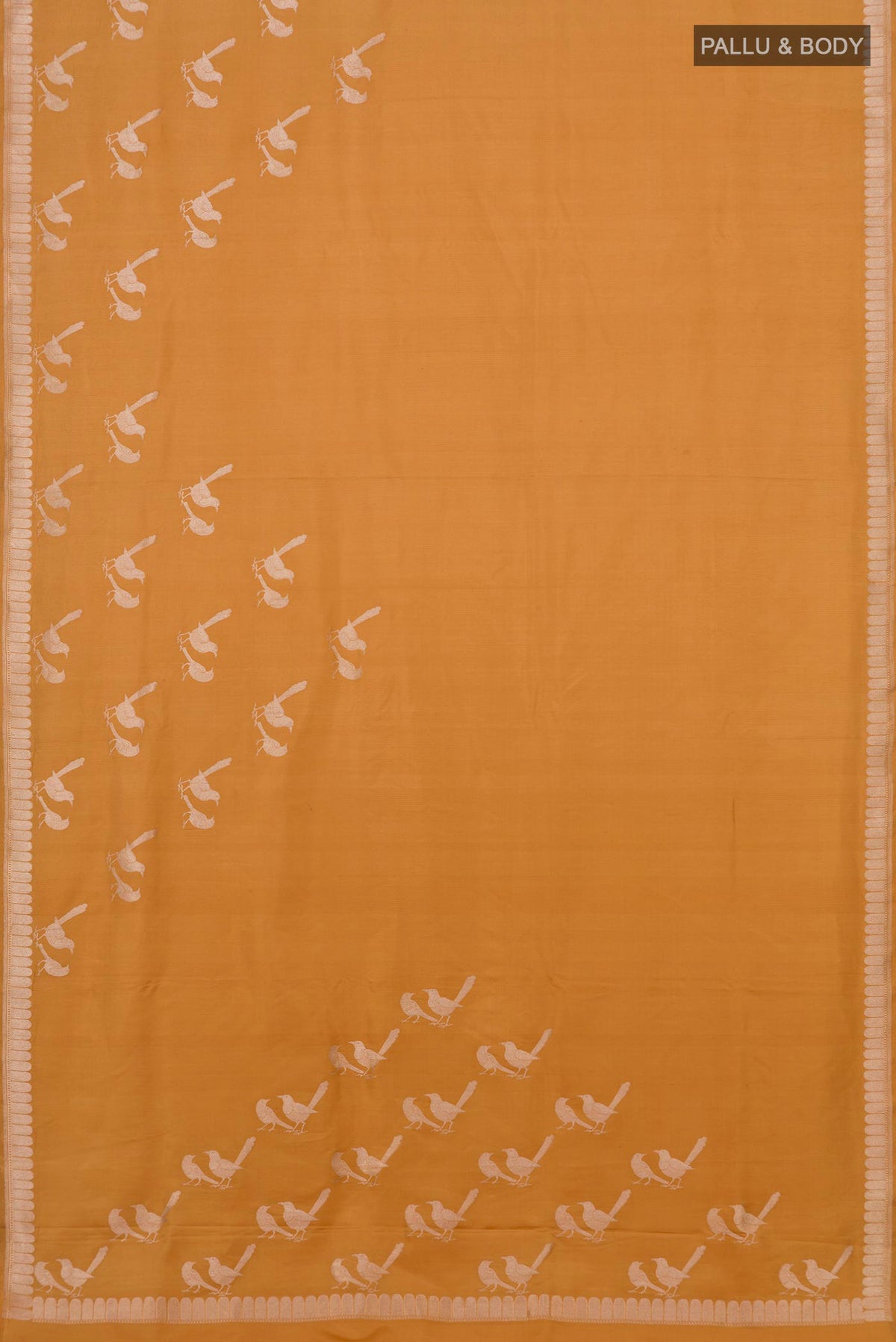 Flat view of Caramel Banarasi Silk Saree with Plain Body and Zari Border. 
