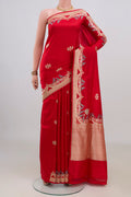 Pure Silk Red Banarasi Saree with Zari Butta on the body and Fancy Border.  displayed on a mannequin