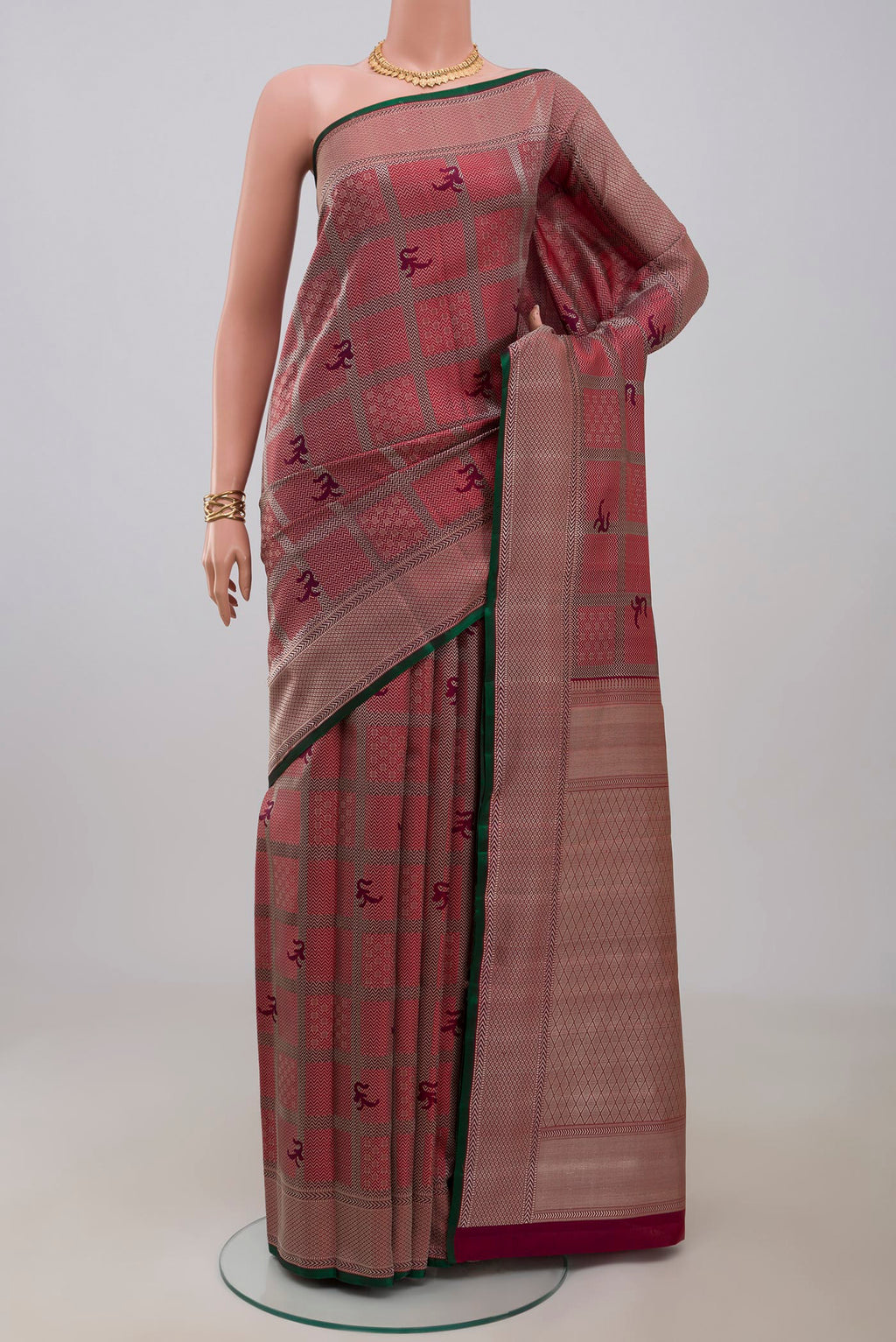 Maroon Kanchipuram Silk Saree with Jacquard design on the body and Thread Border.  displayed on a mannequin