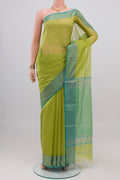 Light Green Maheshwari Silk Cotton Saree with Plain Body and Zari Border.  displayed on a mannequin