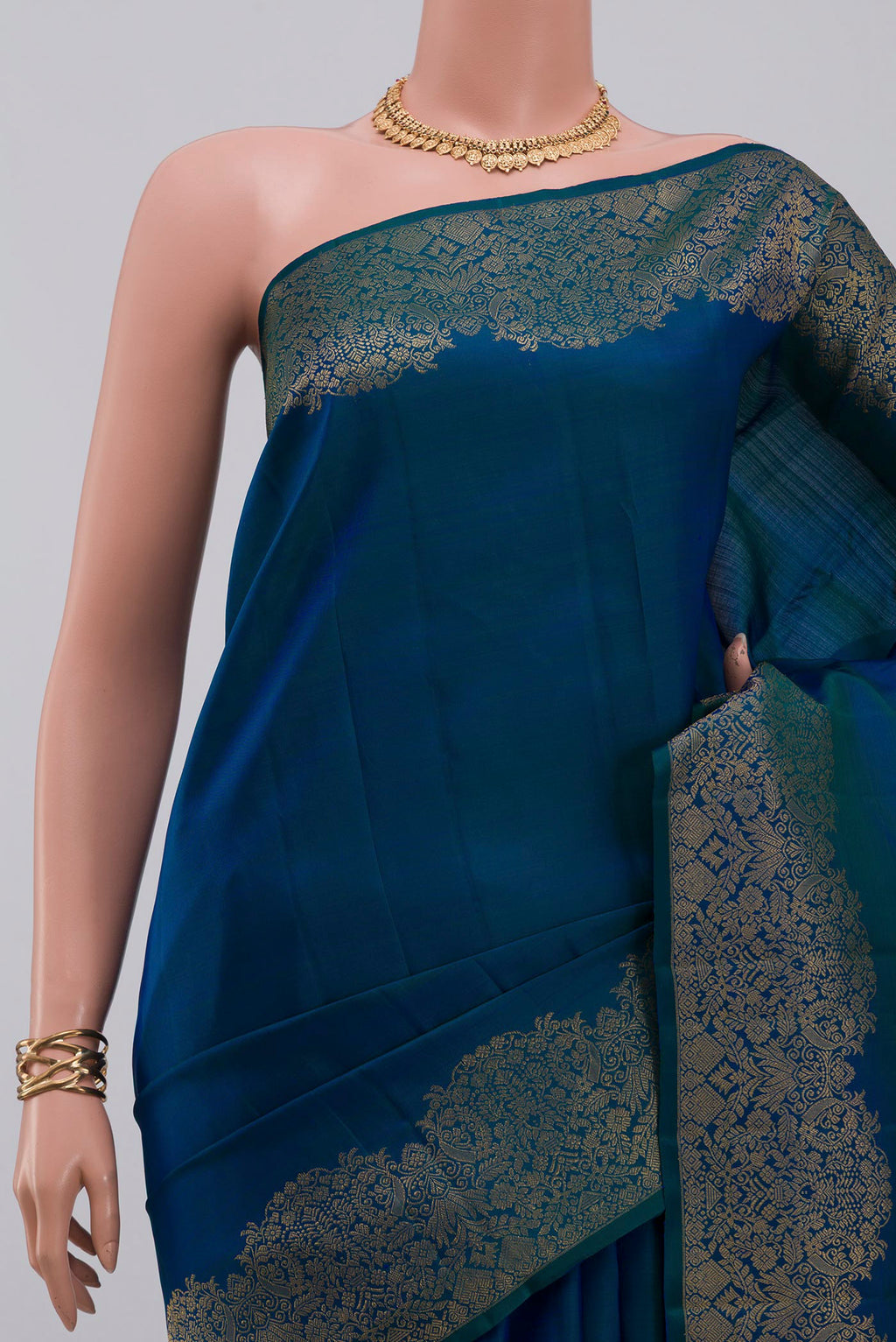 Border image of Blue Kanchipuram Saree with Plain Body and Fancy Border. 