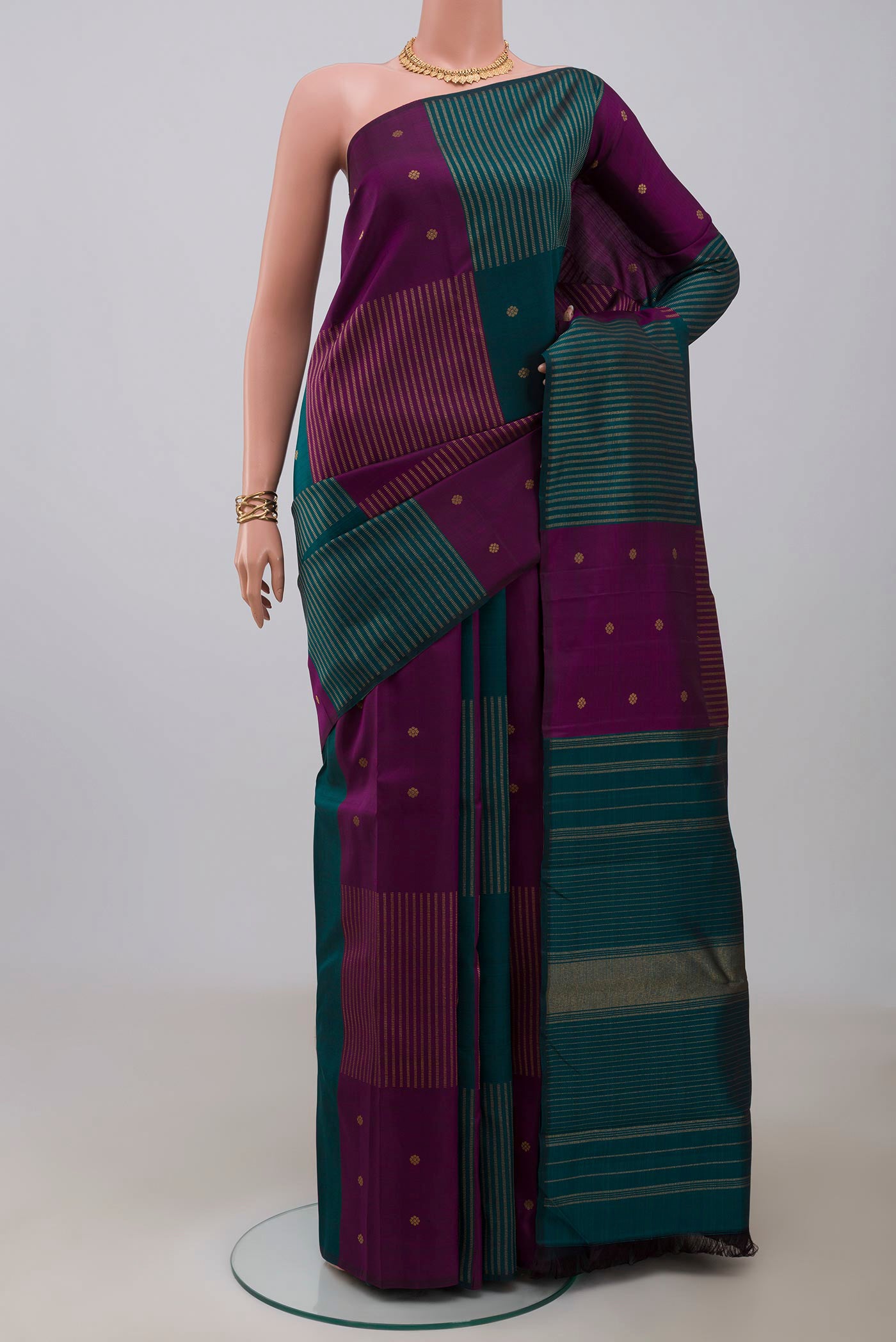 Pure Silk Pure Zari Multi Color Kanchipuram Saree with Fancy on the body and Without Border.  displayed on a mannequin