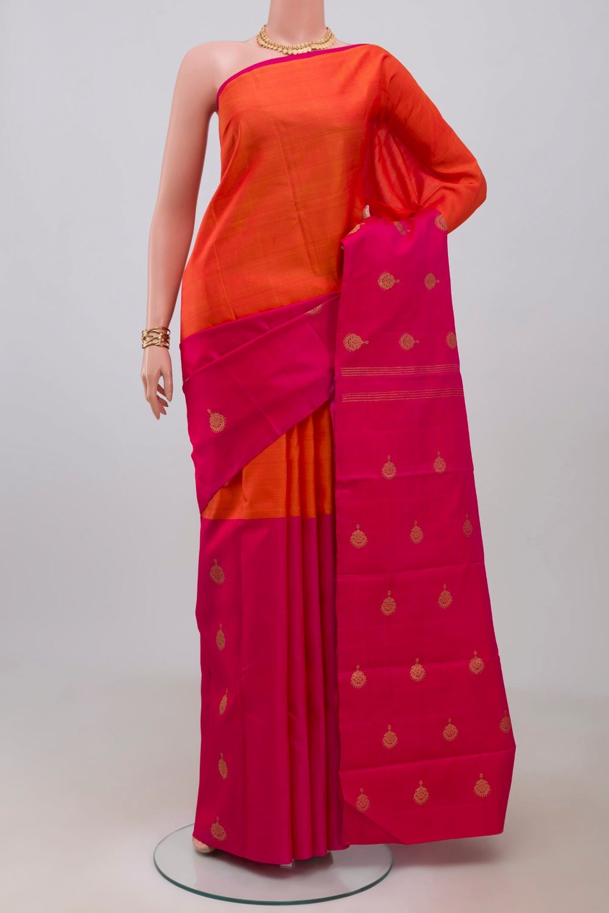 Pure Silk Pure Zari Multi Color Kanchipuram Saree with Half And Half on the body and Without Border.  displayed on a mannequin