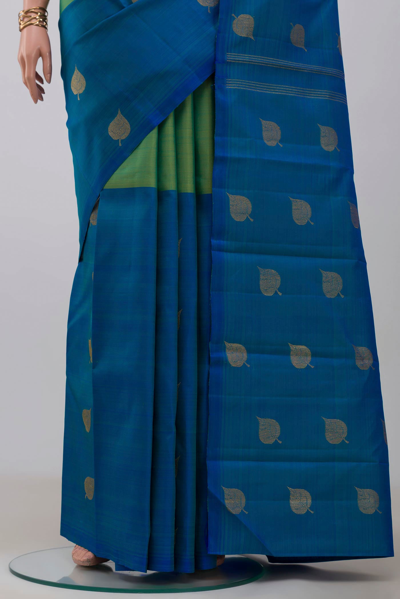 Pleats and pallu of Pure Silk Pure Zari Multi Color Kanchipuram Saree with Half And Half on the body and Without Border. 