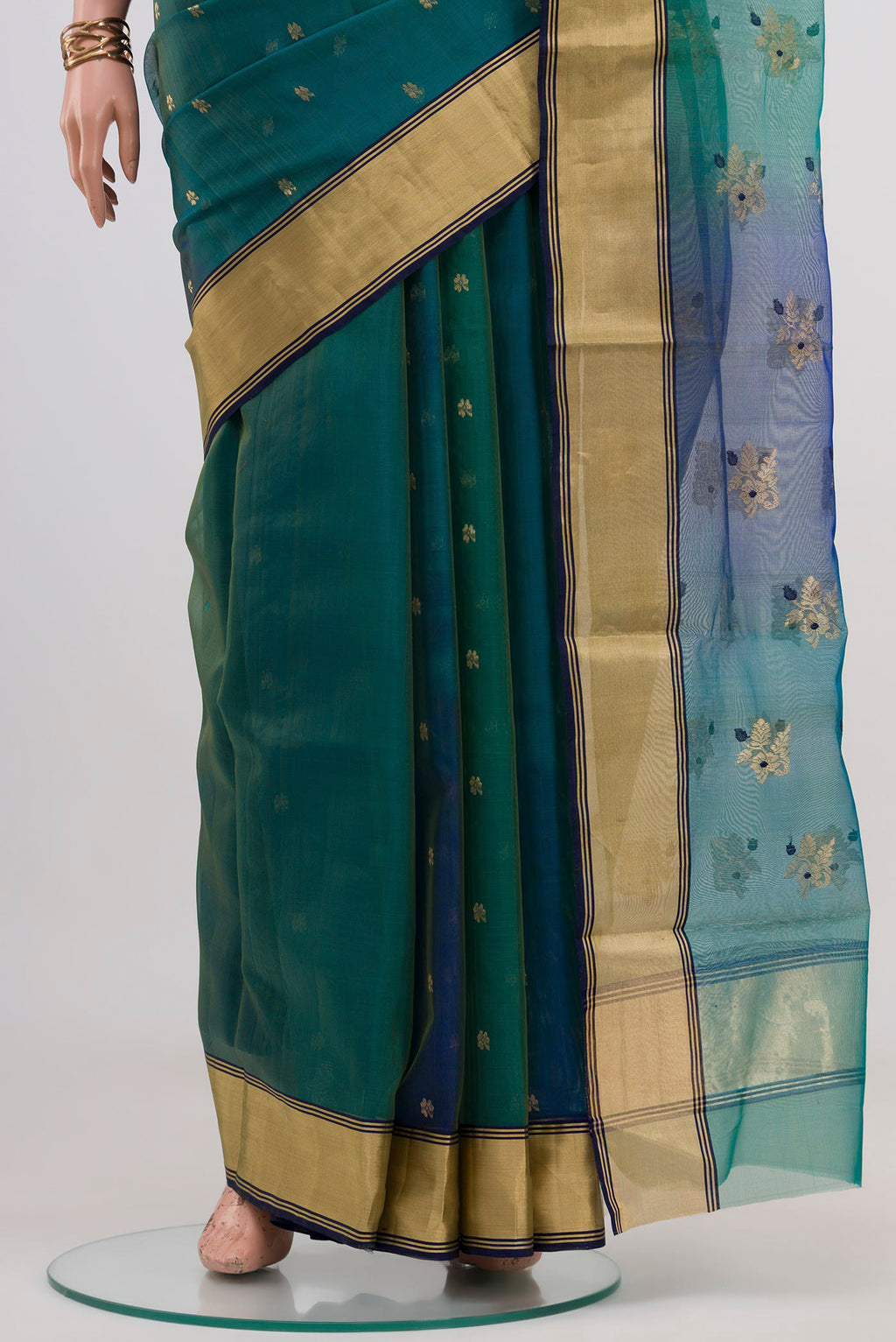 Pleats and pallu of Green Dual Tone Chanderi Silk Cotton Saree with Zari Butta on the body and Zari Border. 