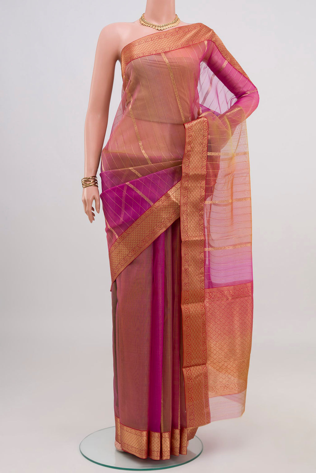 Pink Chanderi Silk Cotton Saree with Zari Butta on the body and Zari Border.  displayed on a mannequin