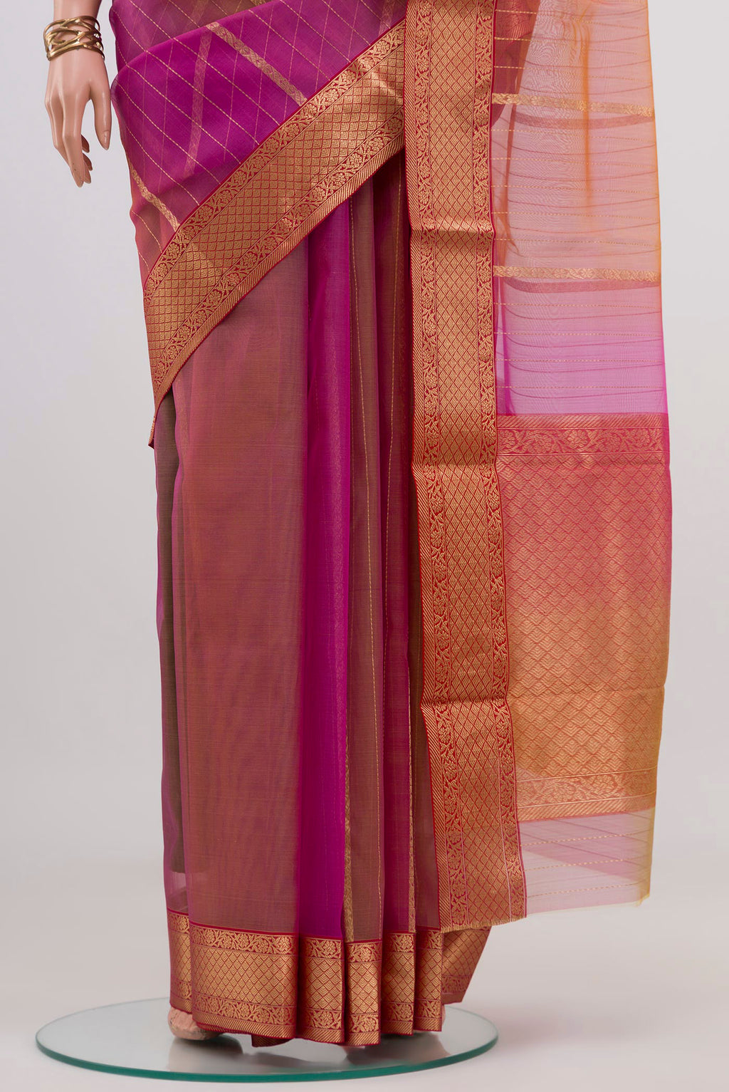 Pleats and pallu of Pink Chanderi Silk Cotton Saree with Zari Butta on the body and Zari Border. 