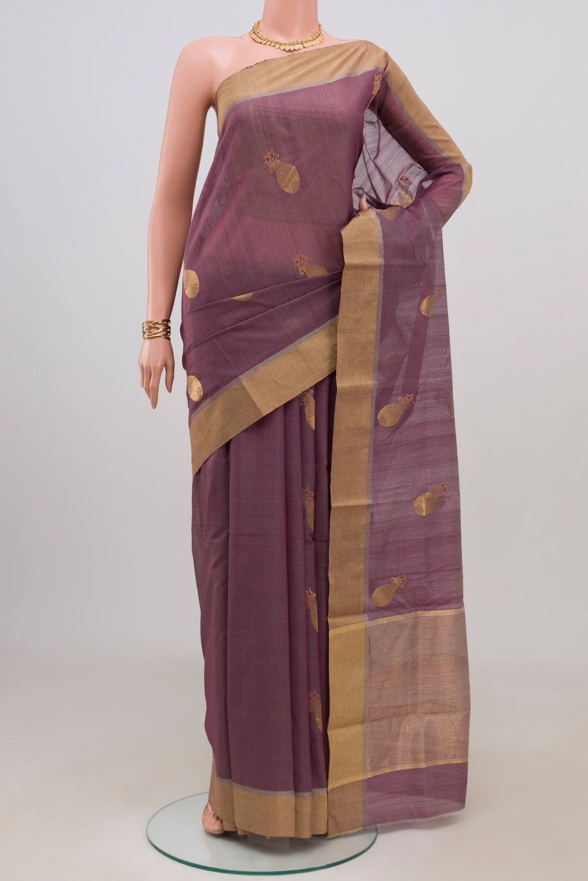 Lavender Chanderi Silk Cotton Saree with Zari Butta on the body and Zari Border.  displayed on a mannequin