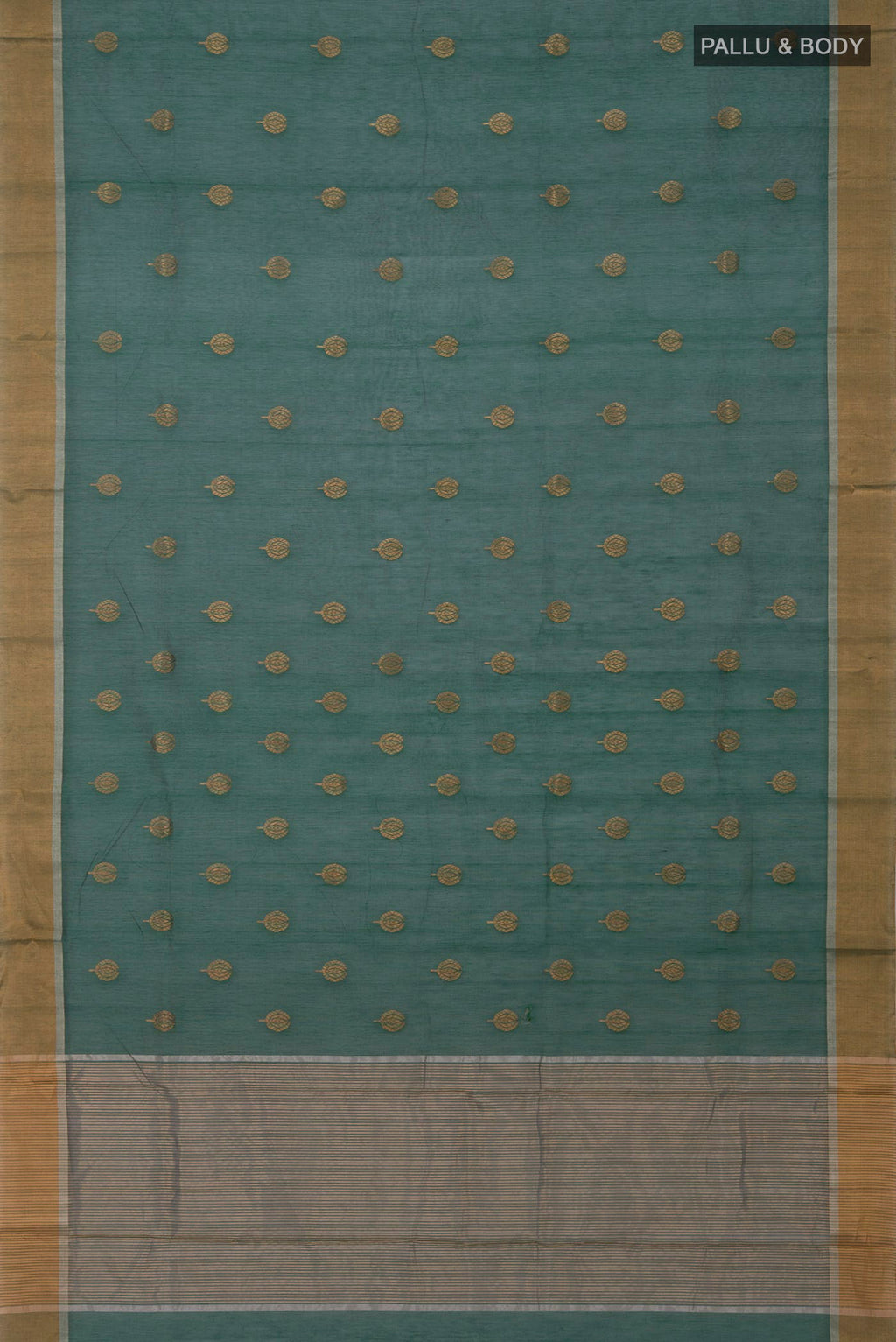 Flat view of Bottle Green Chanderi Silk Cotton Saree with Zari Butta on the body and Zari Border. 