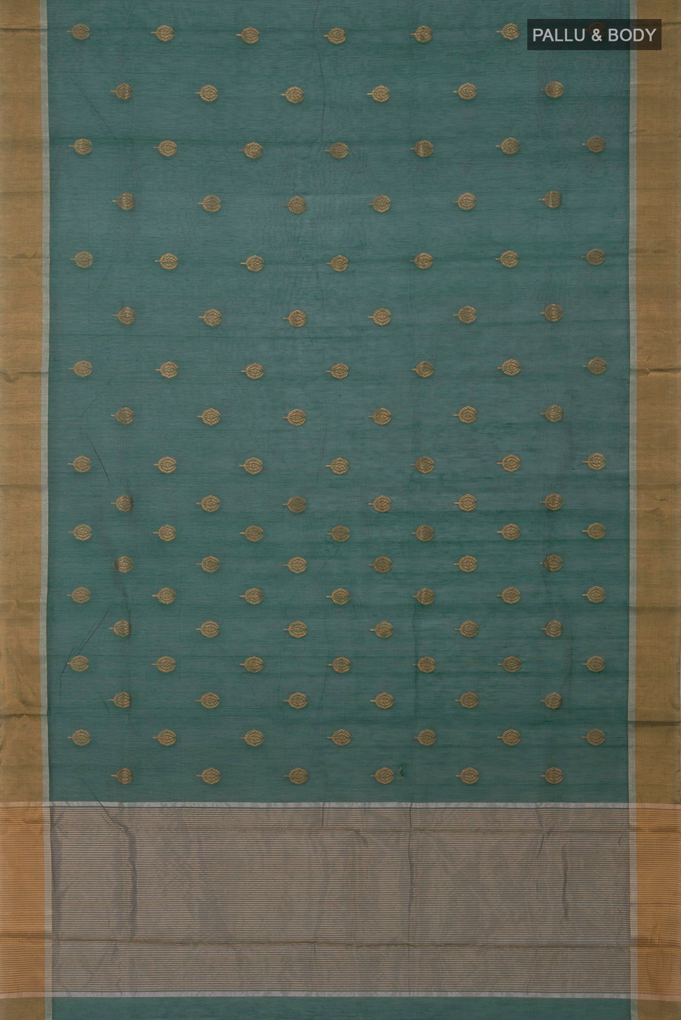 Flat view of Bottle Green Chanderi Silk Cotton Saree with Zari Butta on the body and Zari Border. 