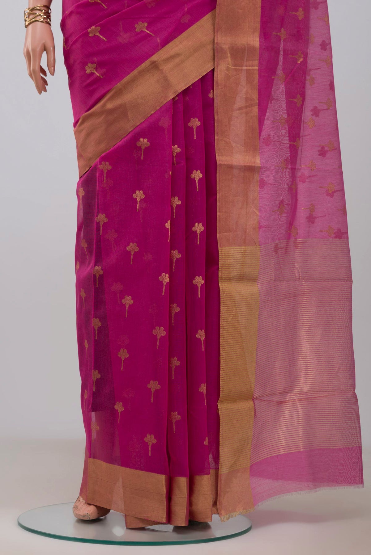 Pleats and pallu of Pink Chanderi Silk Cotton Saree with Zari Butta on the body and Zari Border. 
