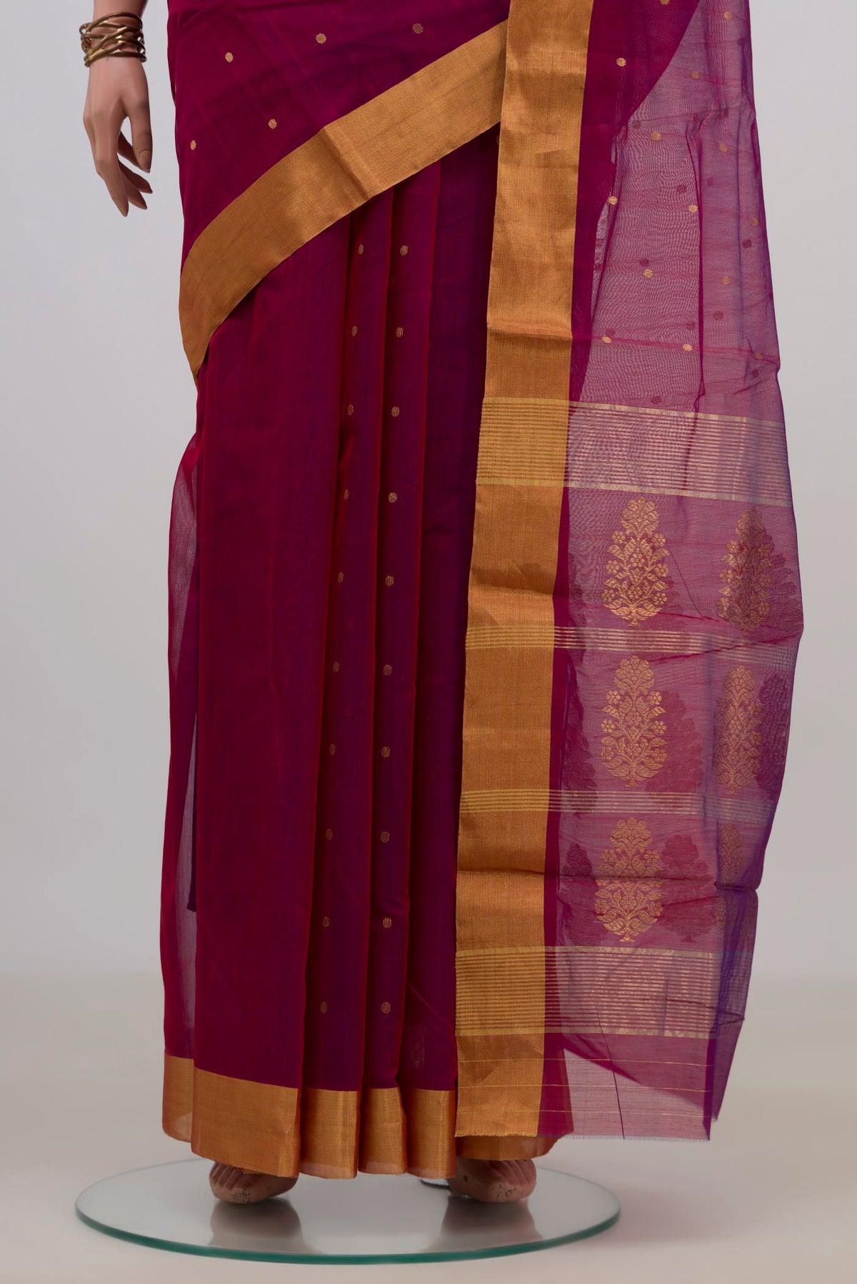Pleats and pallu of Magenta Chanderi Cotton Saree with Zari Butta on the body and Zari Border. 