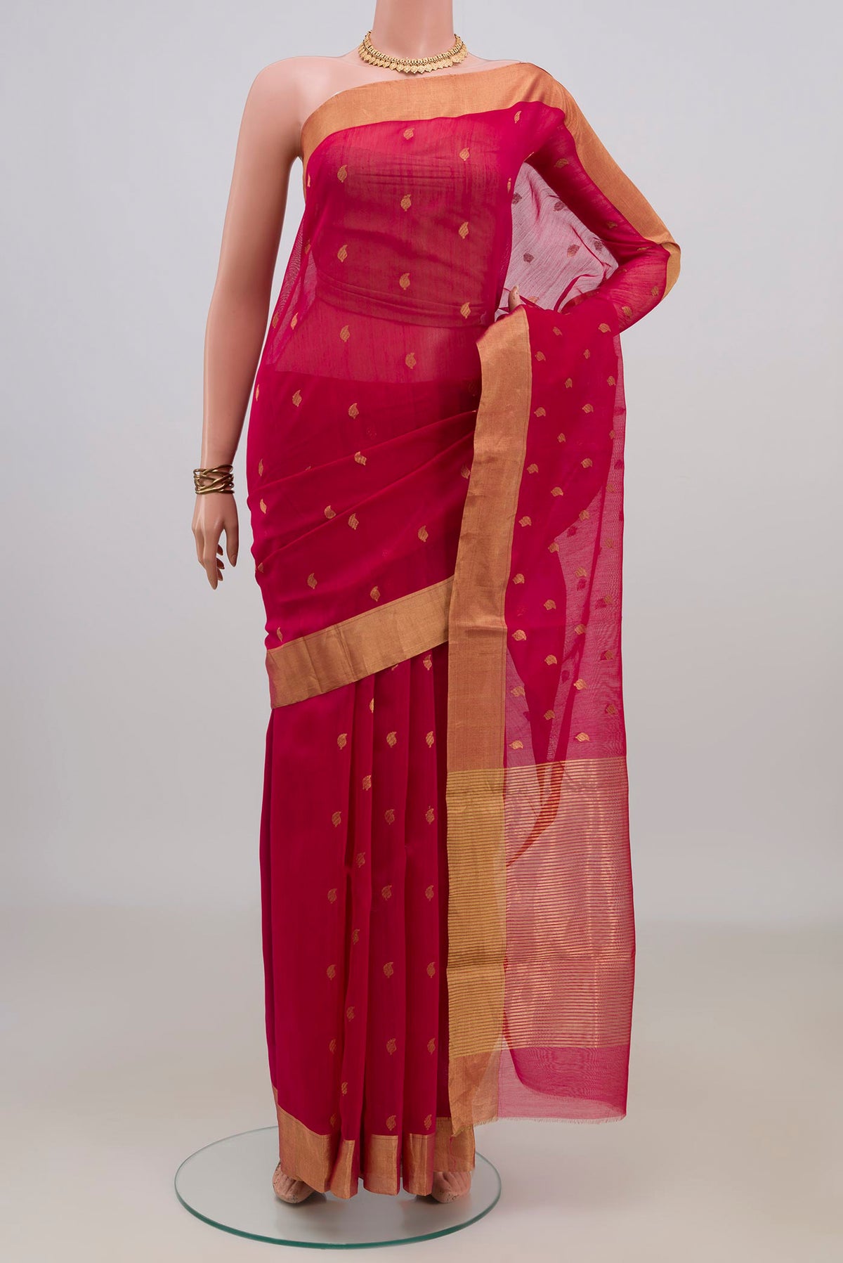 Pink Chanderi Cotton Saree with Zari Butta on the body and Zari Border.  displayed on a mannequin