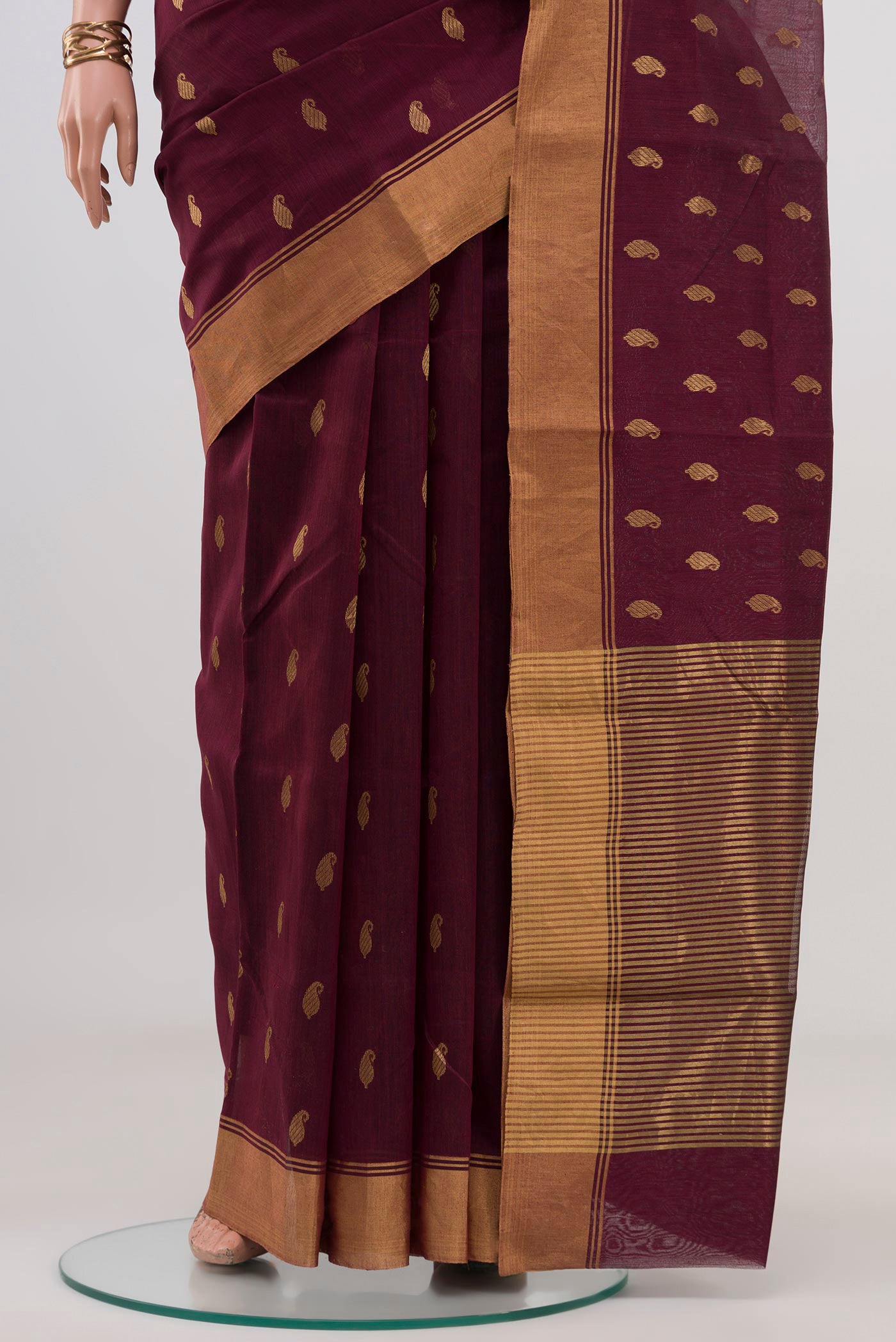 Pleats and pallu of Brown Chanderi Silk Cotton Saree with Zari Butta on the body and Zari Border. 