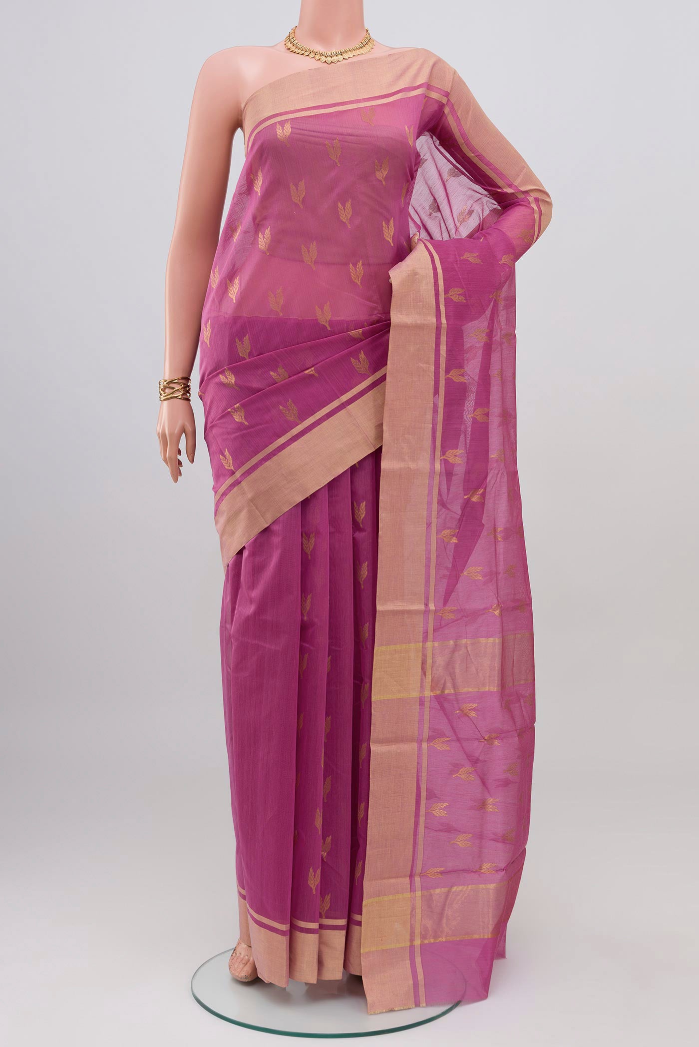 Lavender Chanderi Silk Cotton Saree with Zari Butta on the body and Zari Border.  displayed on a mannequin